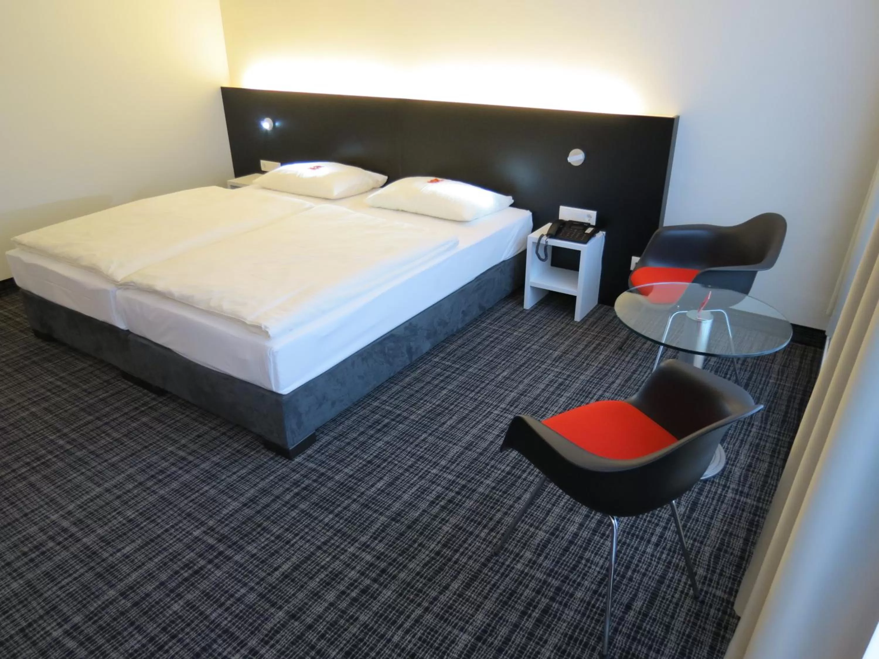 Bed in Comfor Hotel Ulm City
