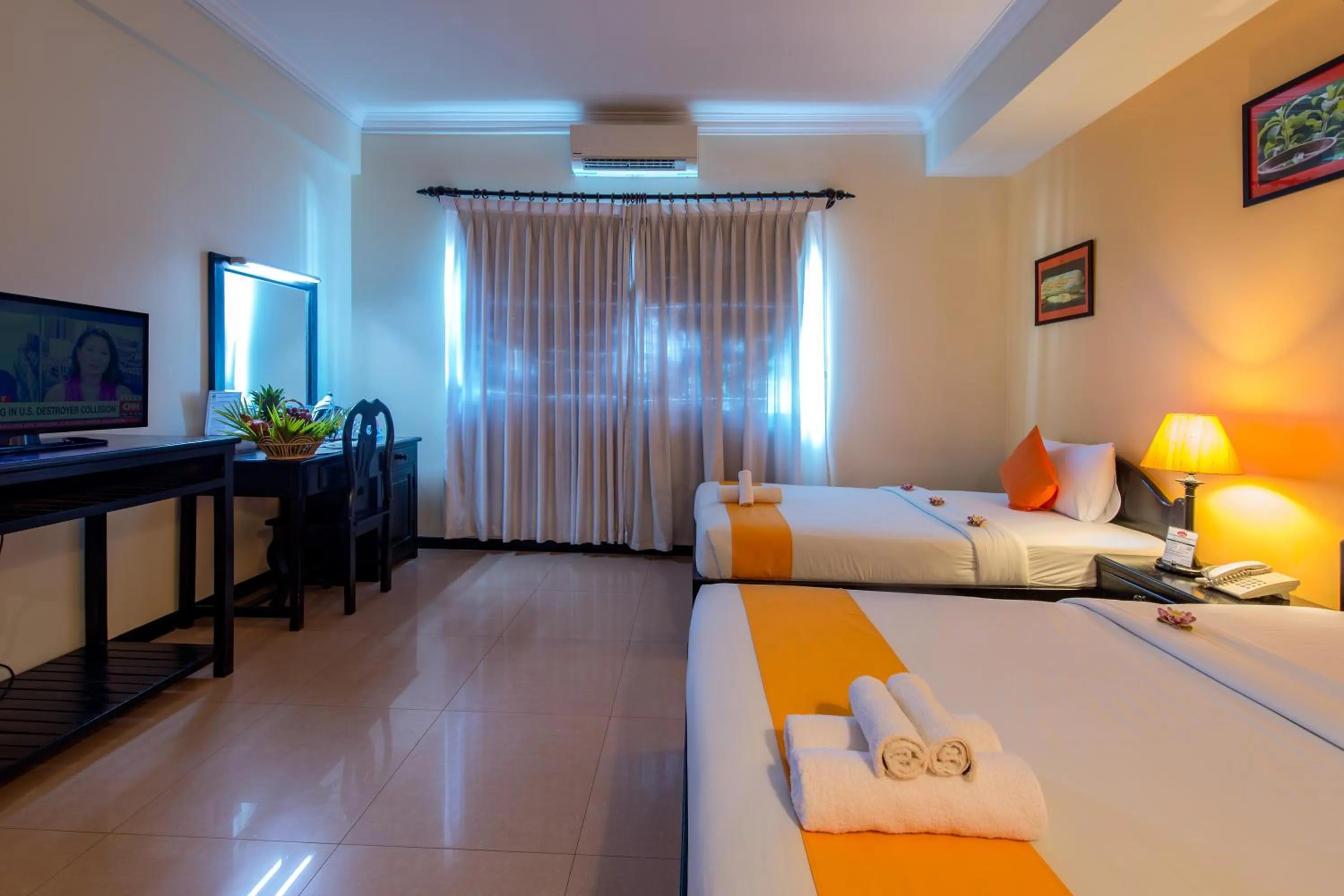 Bed in Angkor Panoramic Boutique Hotel