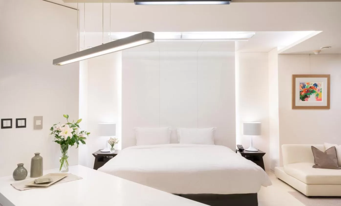 Bed in The Classic 500 Pentaz Executive Residence