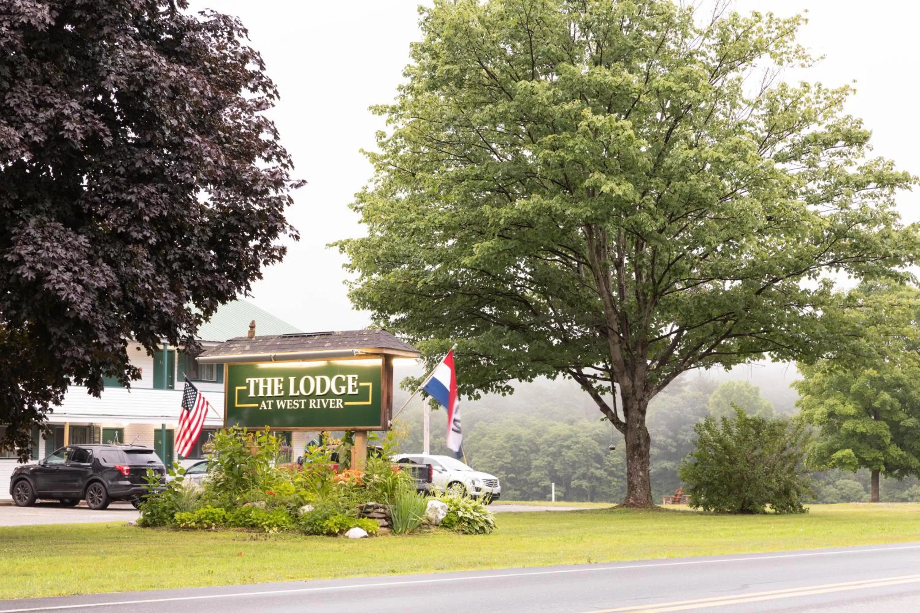 Property logo or sign in The Lodge at West River