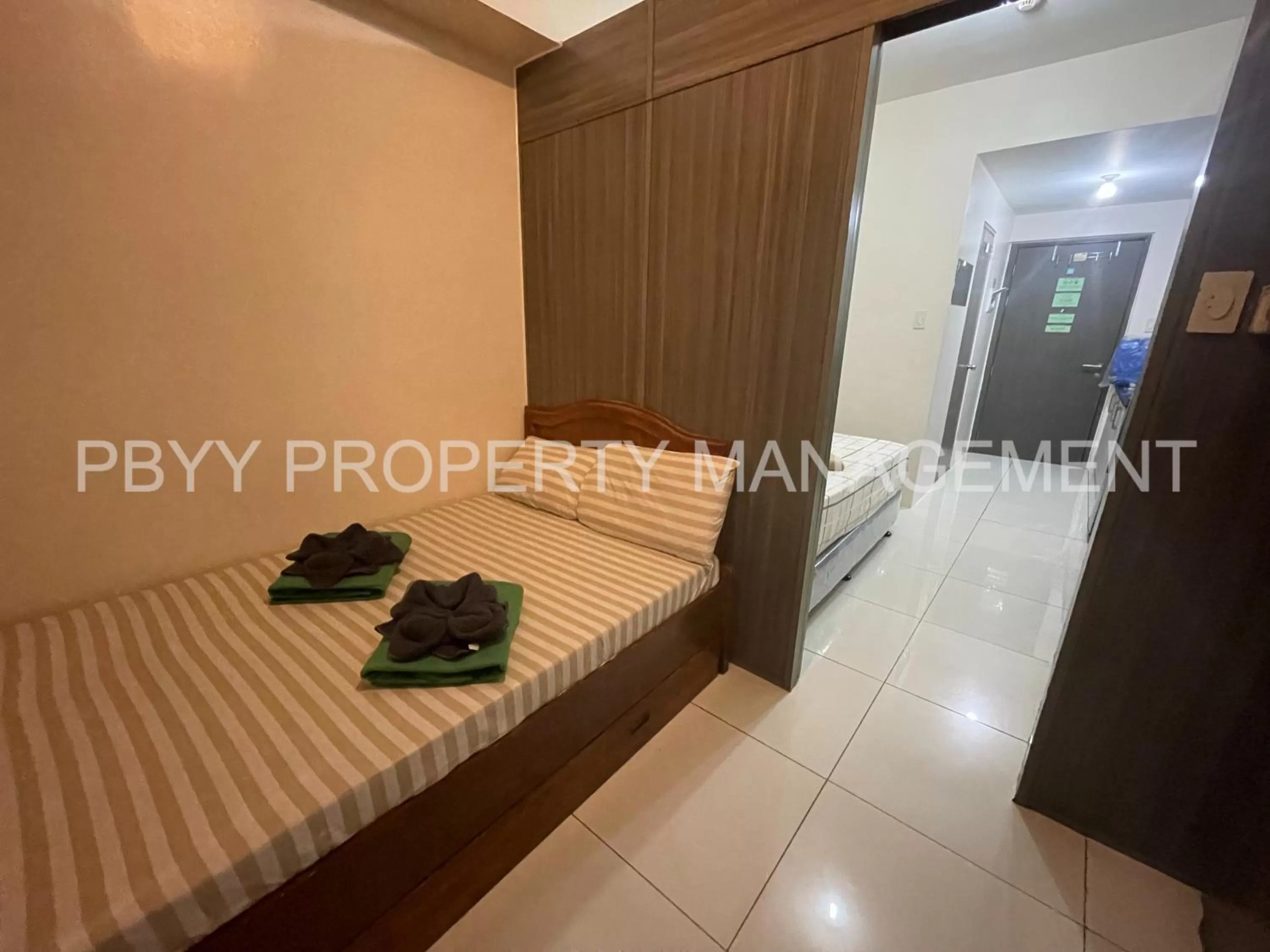 Bedroom in Green Residences Staycation by PBYY