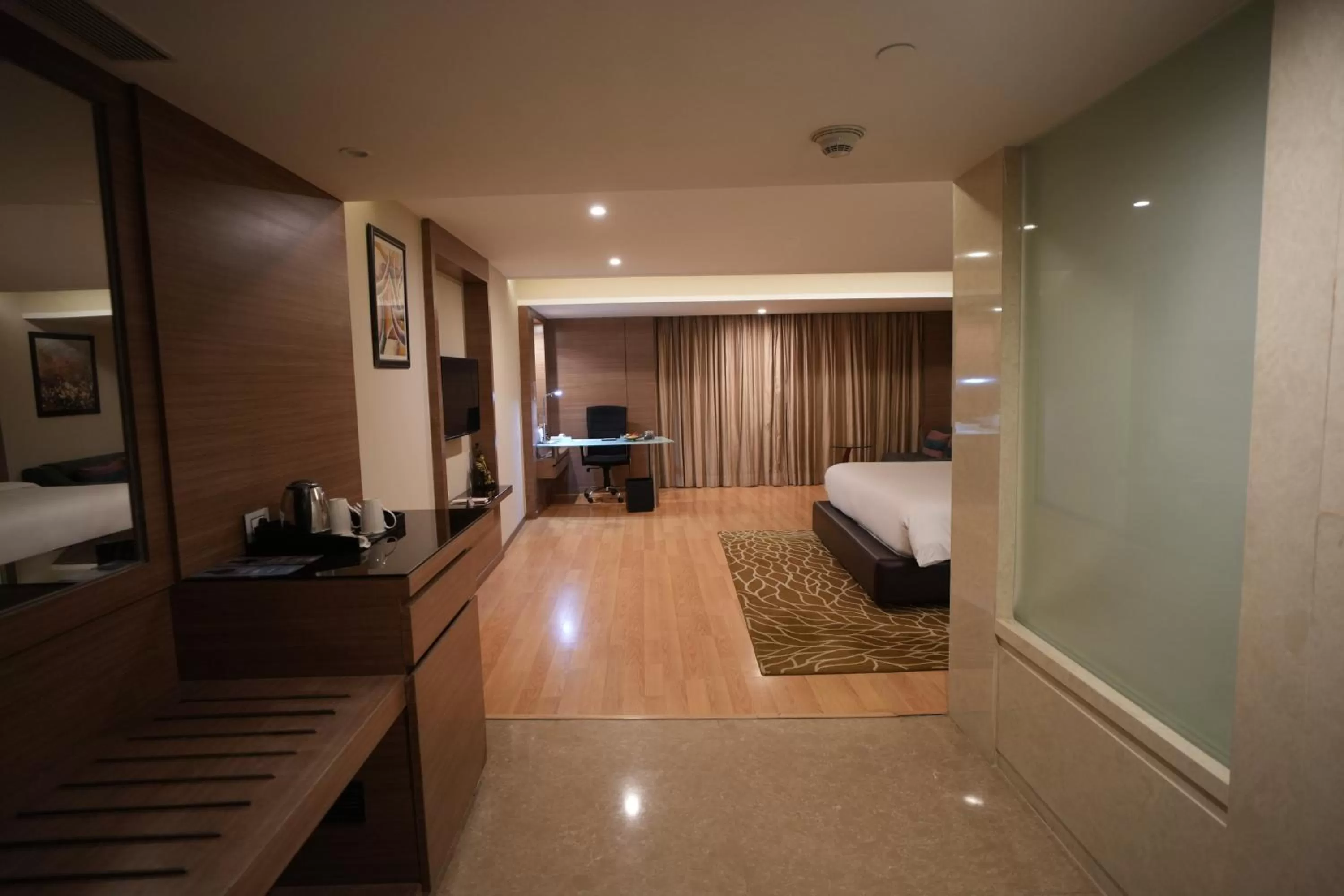 Photo of the whole room, Bed in Radisson Udaipur