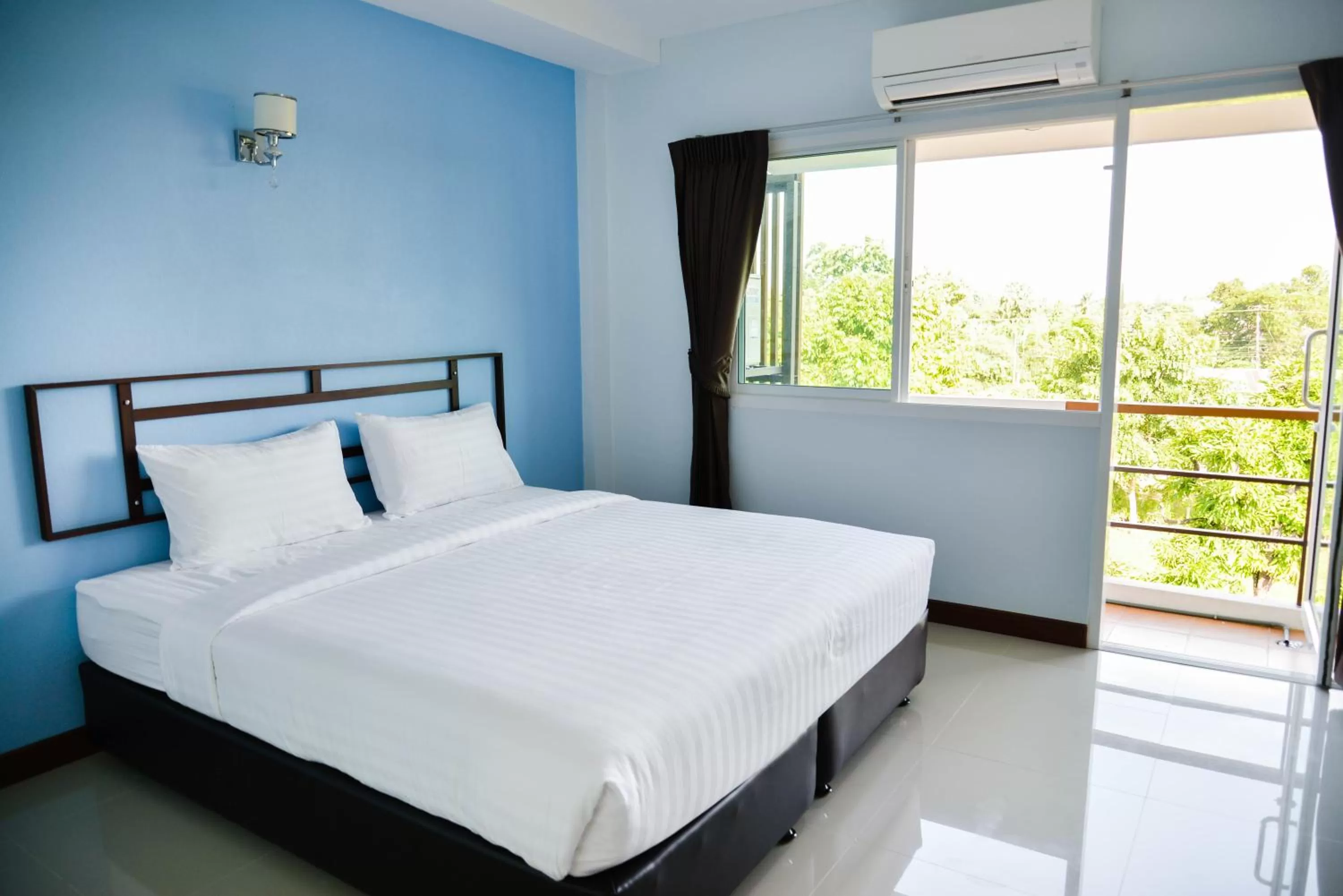 Bed in Thaimit Resort