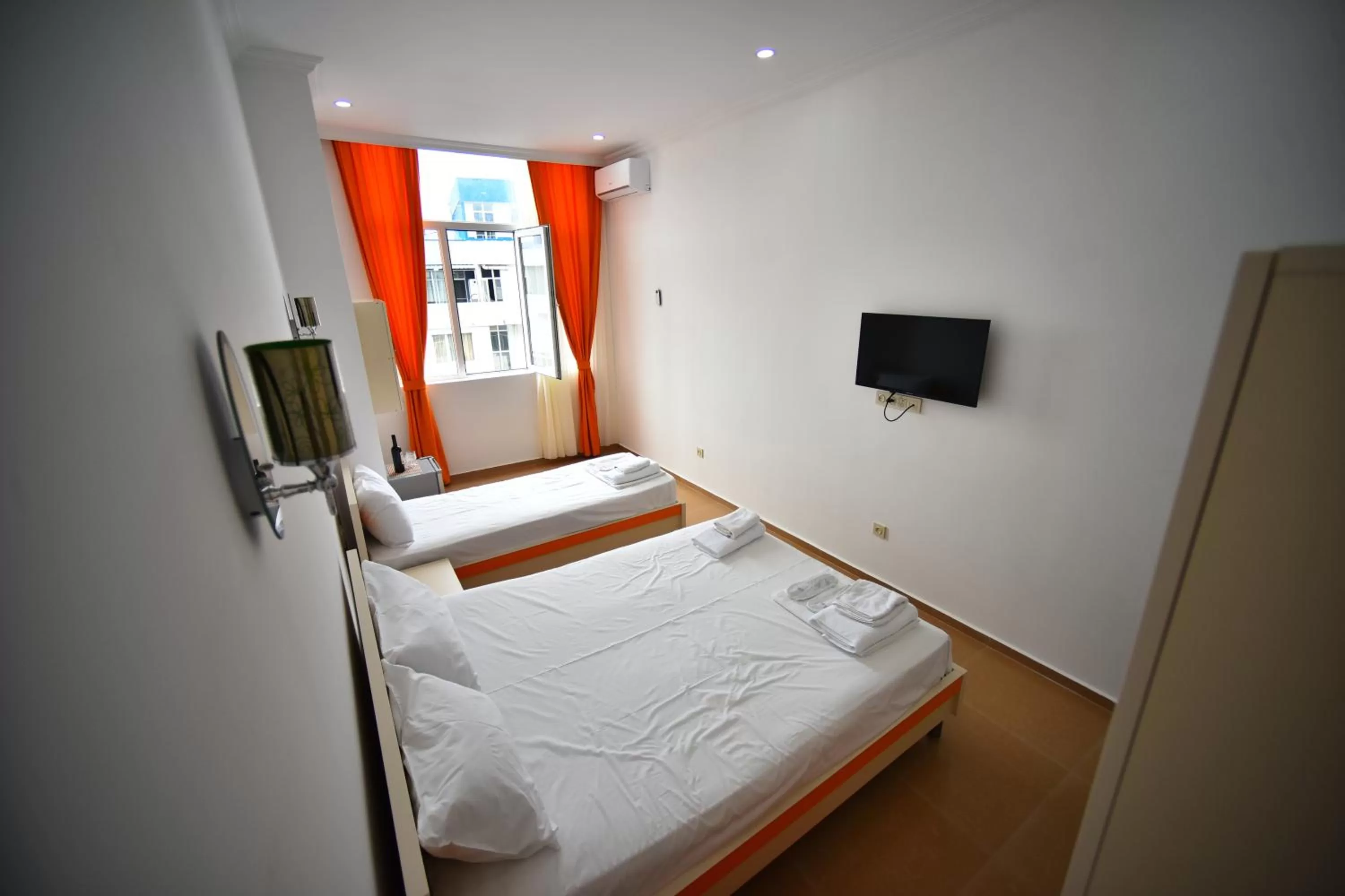 Bed in Orange Home Hotel