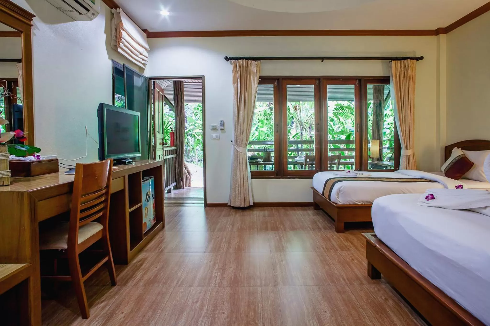 Bed in The Vatika Resort and Spa