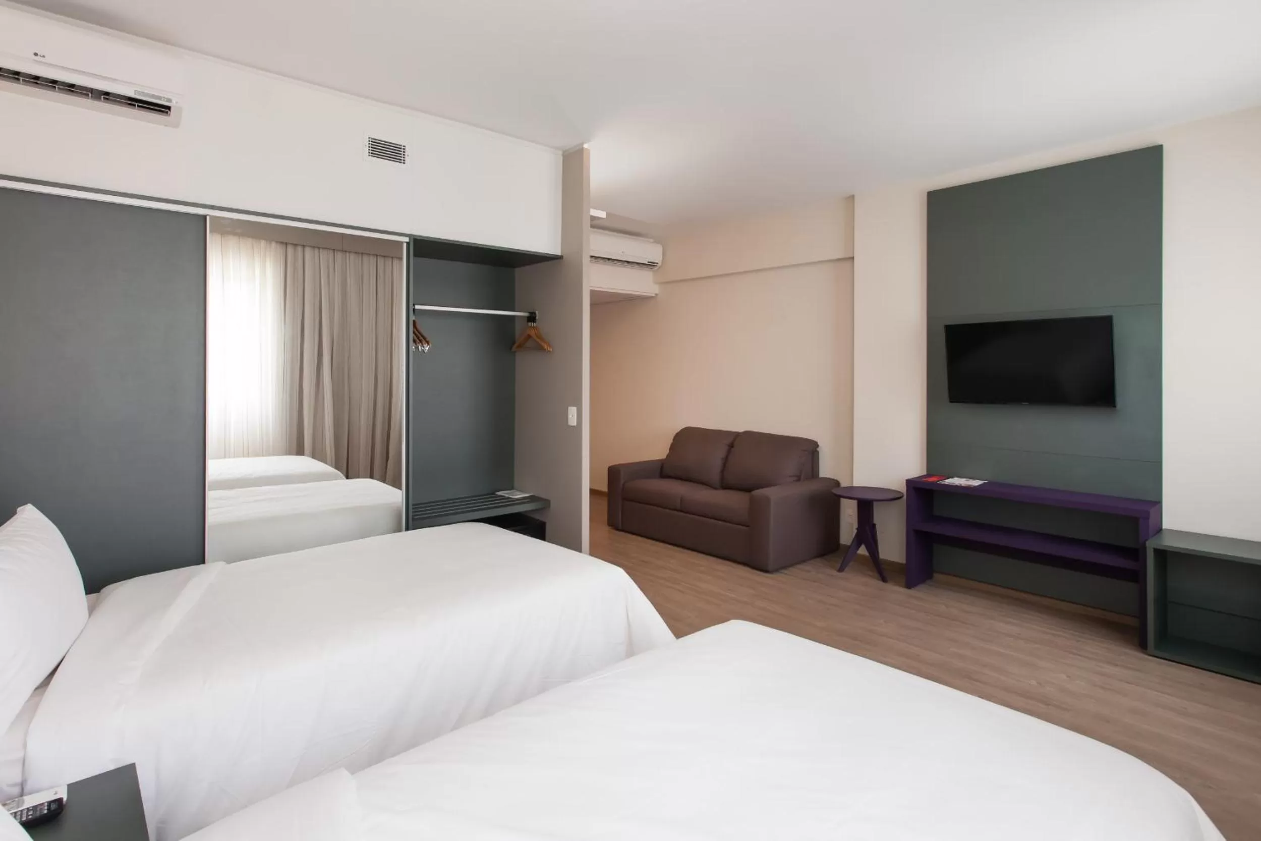 Bed in eSuites Virgínia Luxemburgo