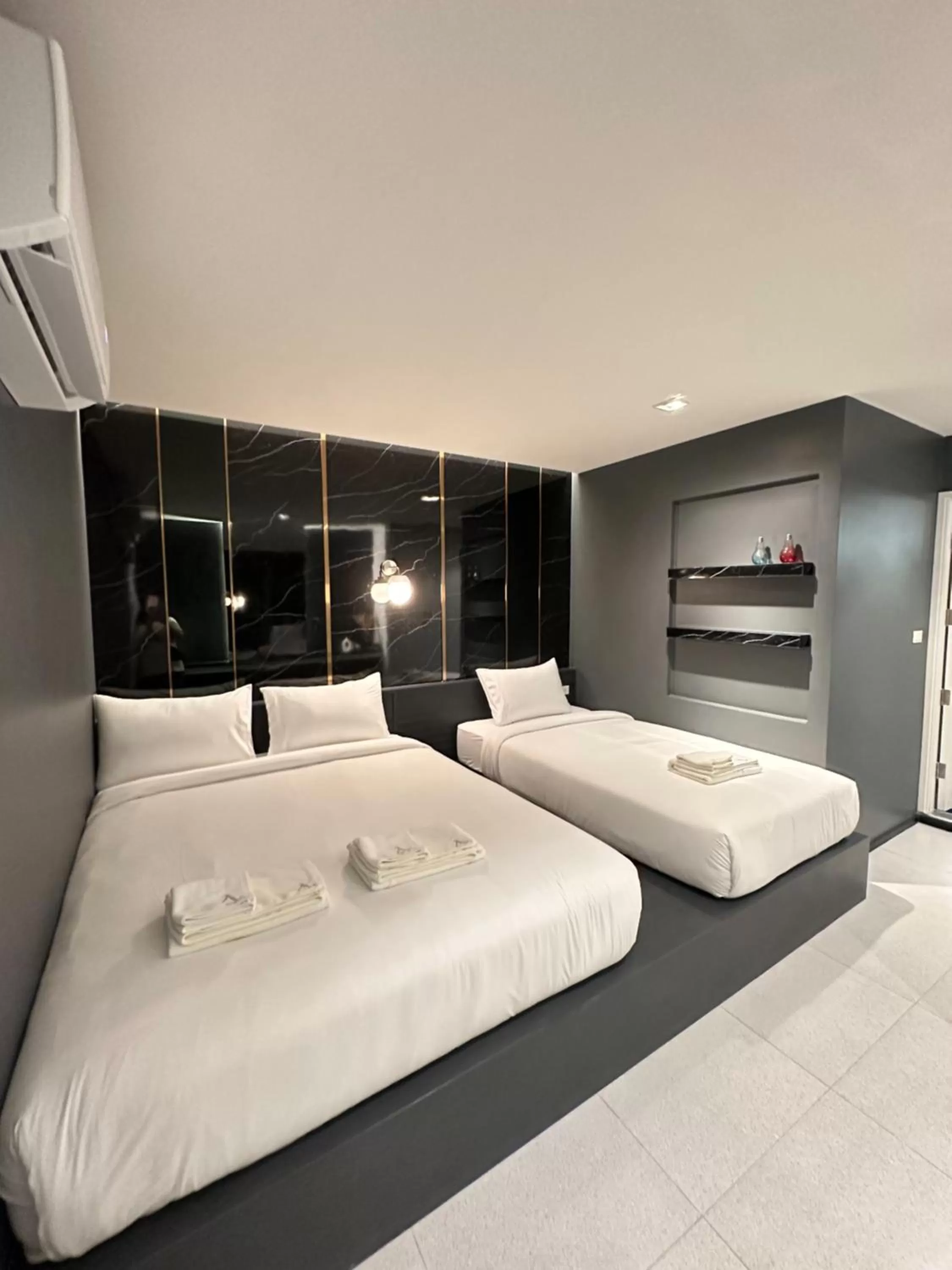 Bed in Ascella Bangkok Hotel