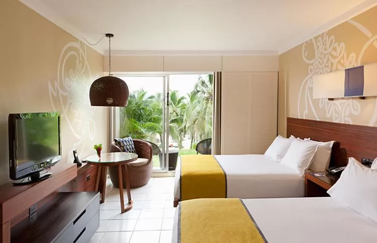 Bed in Holiday Inn Resort Vanuatu by IHG