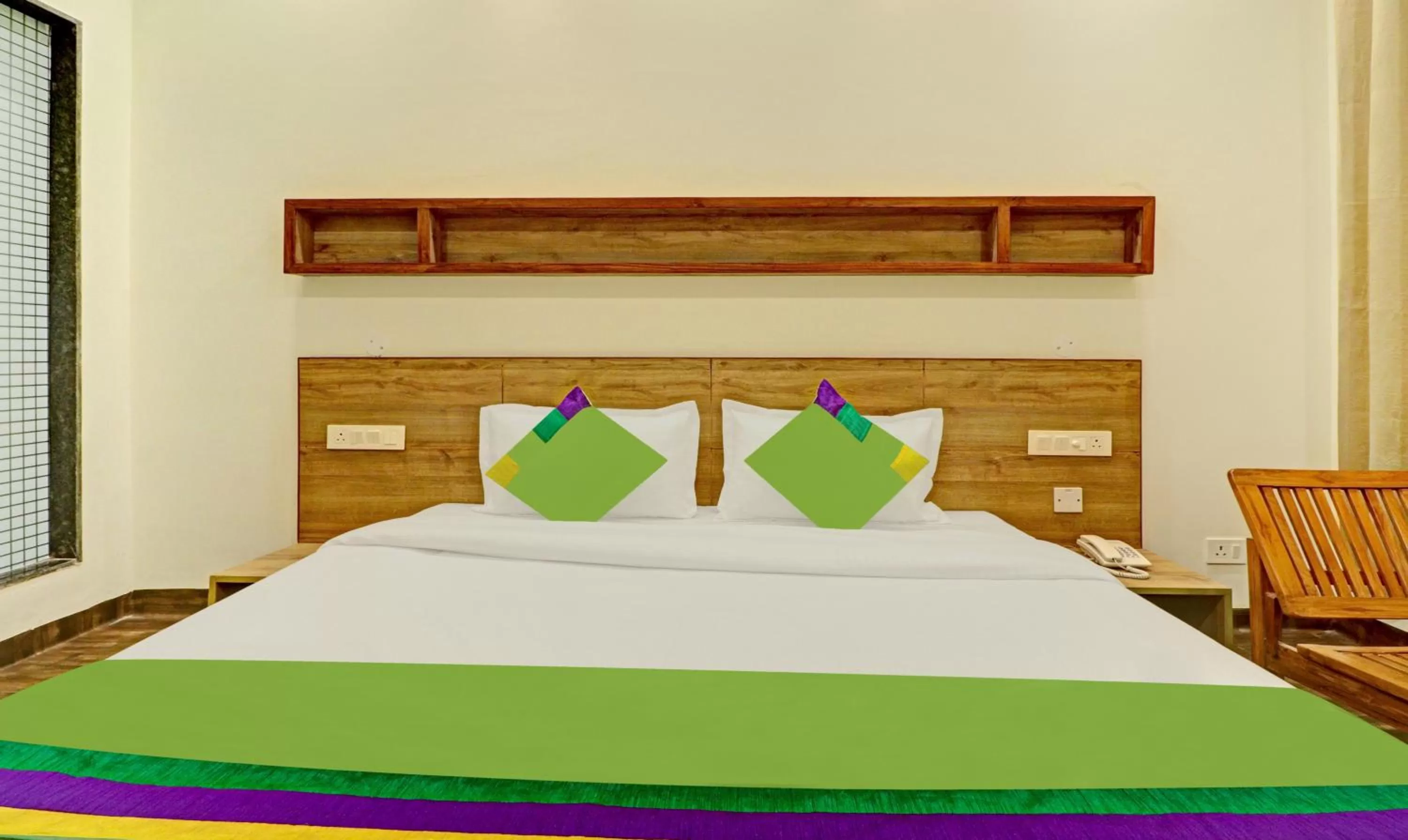 Bed in Treebo Delmont