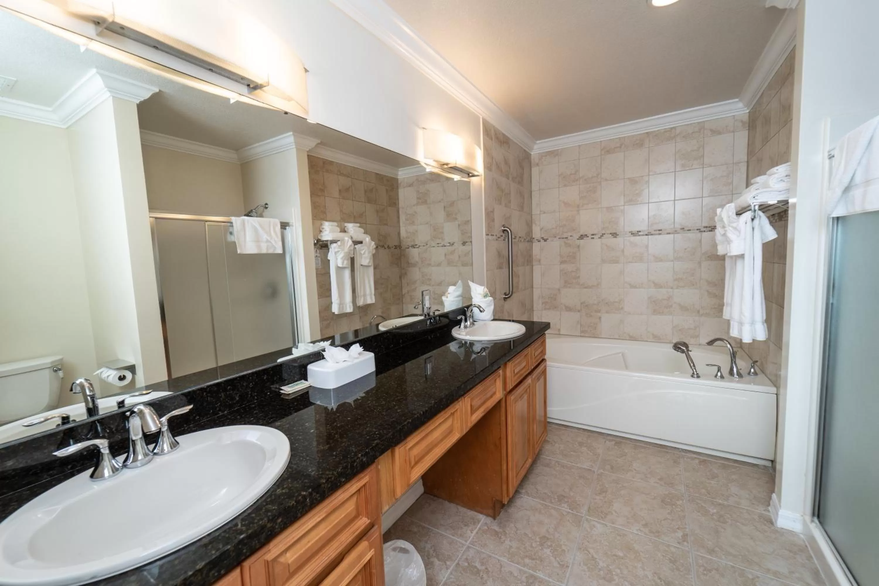 Shower in Holiday Inn Resort Grand Cayman by IHG