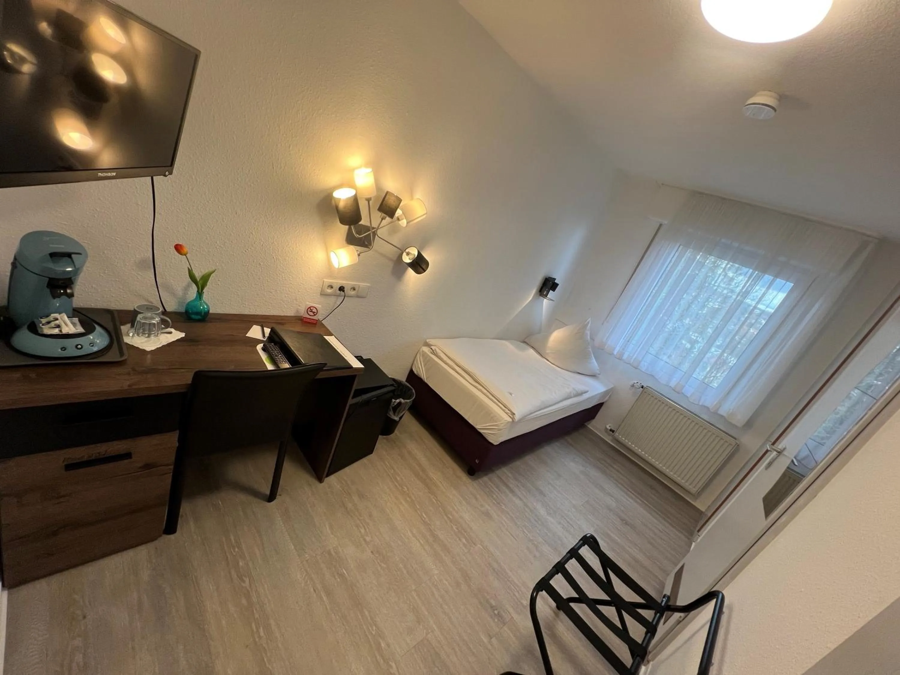 Photo of the whole room, Bed in Hotel Bitzer Backnang