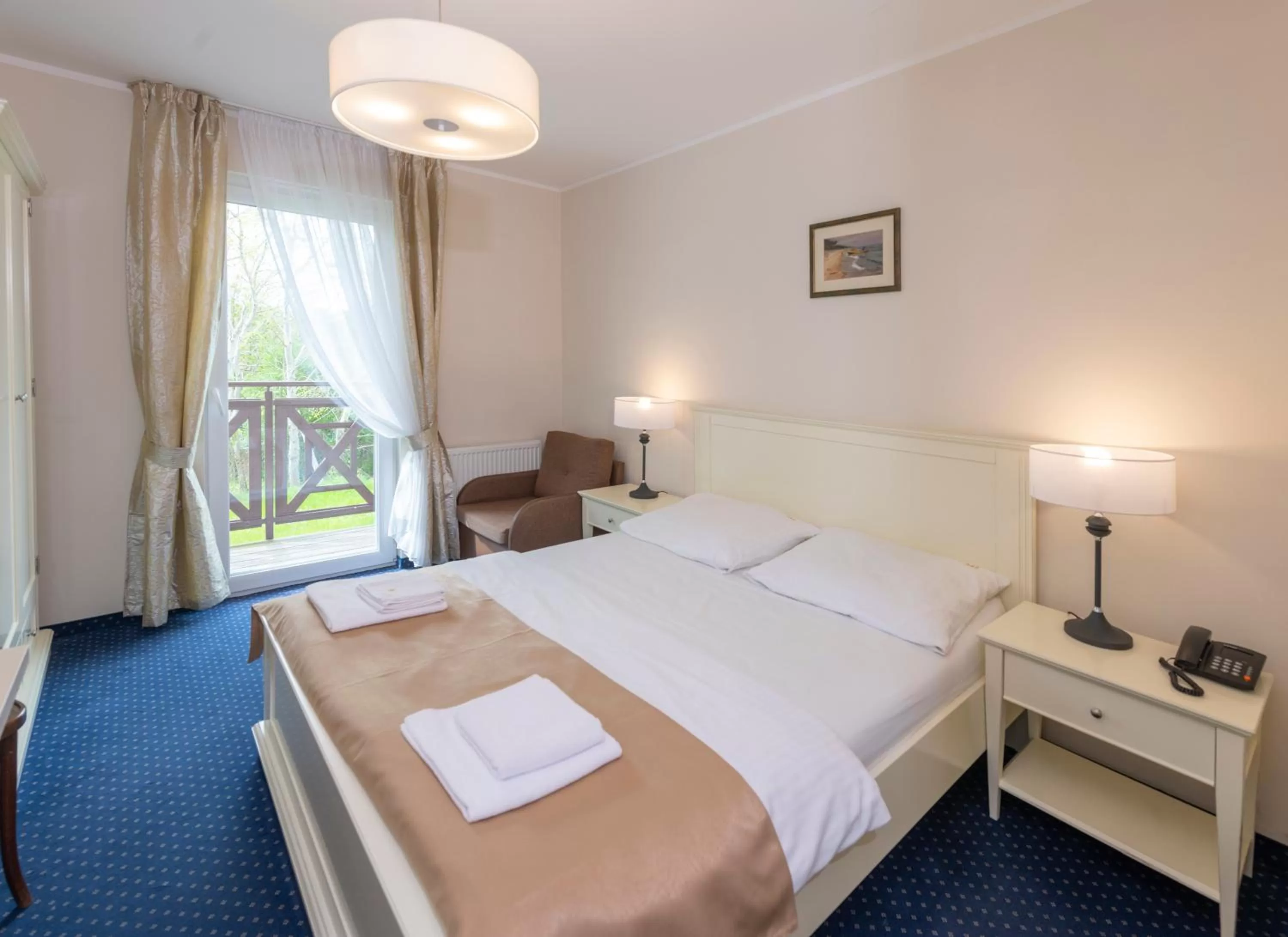 Bed in Hotel Mona Lisa Wellness & Spa