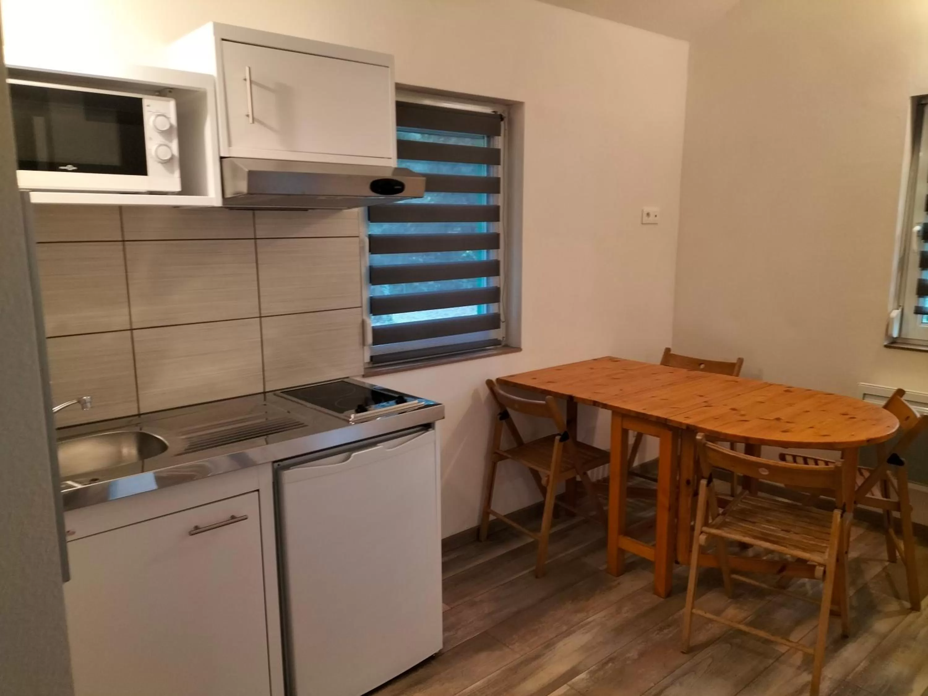 Kitchen or kitchenette in Les ACACIAS