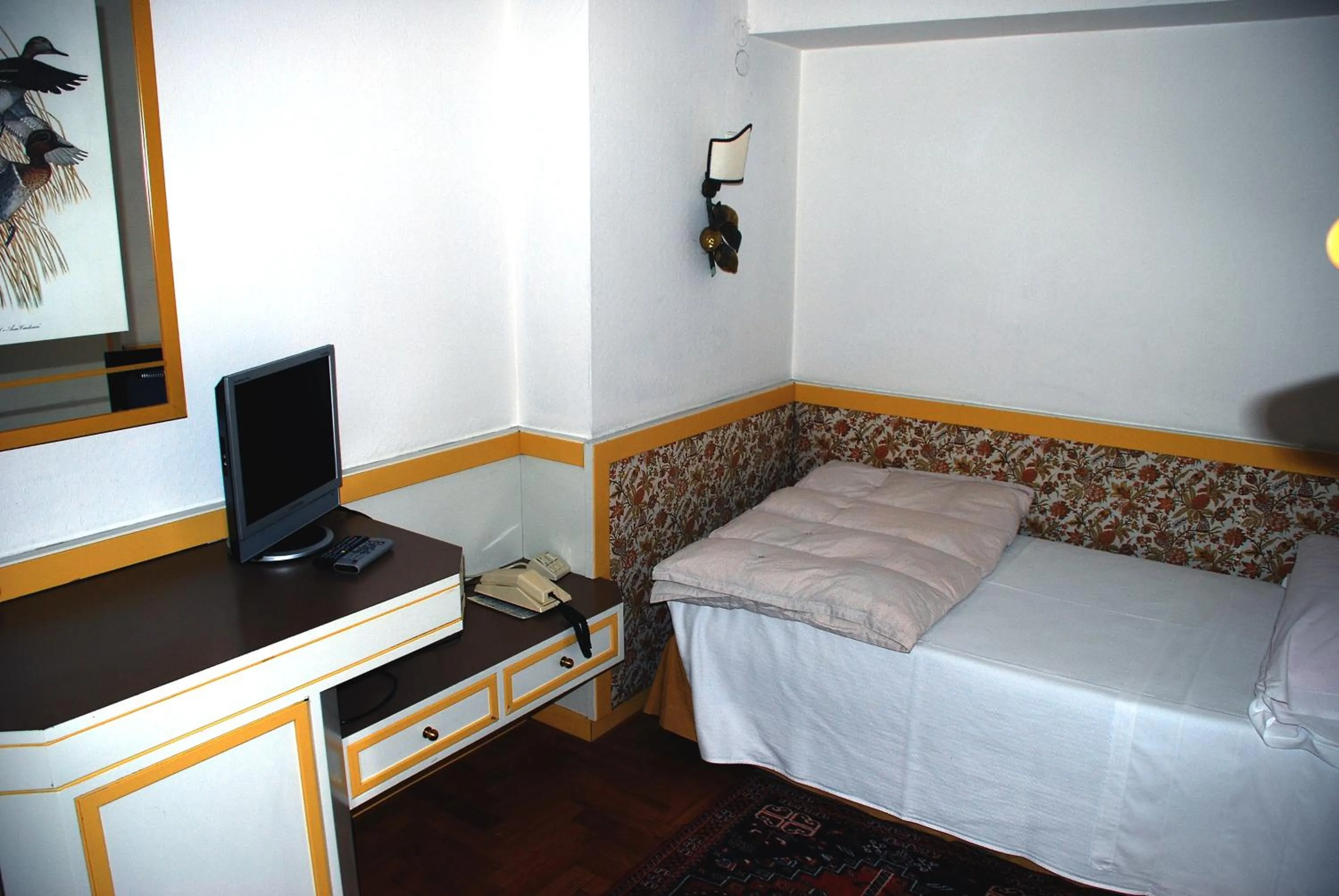Bed in Hotel De La Poste