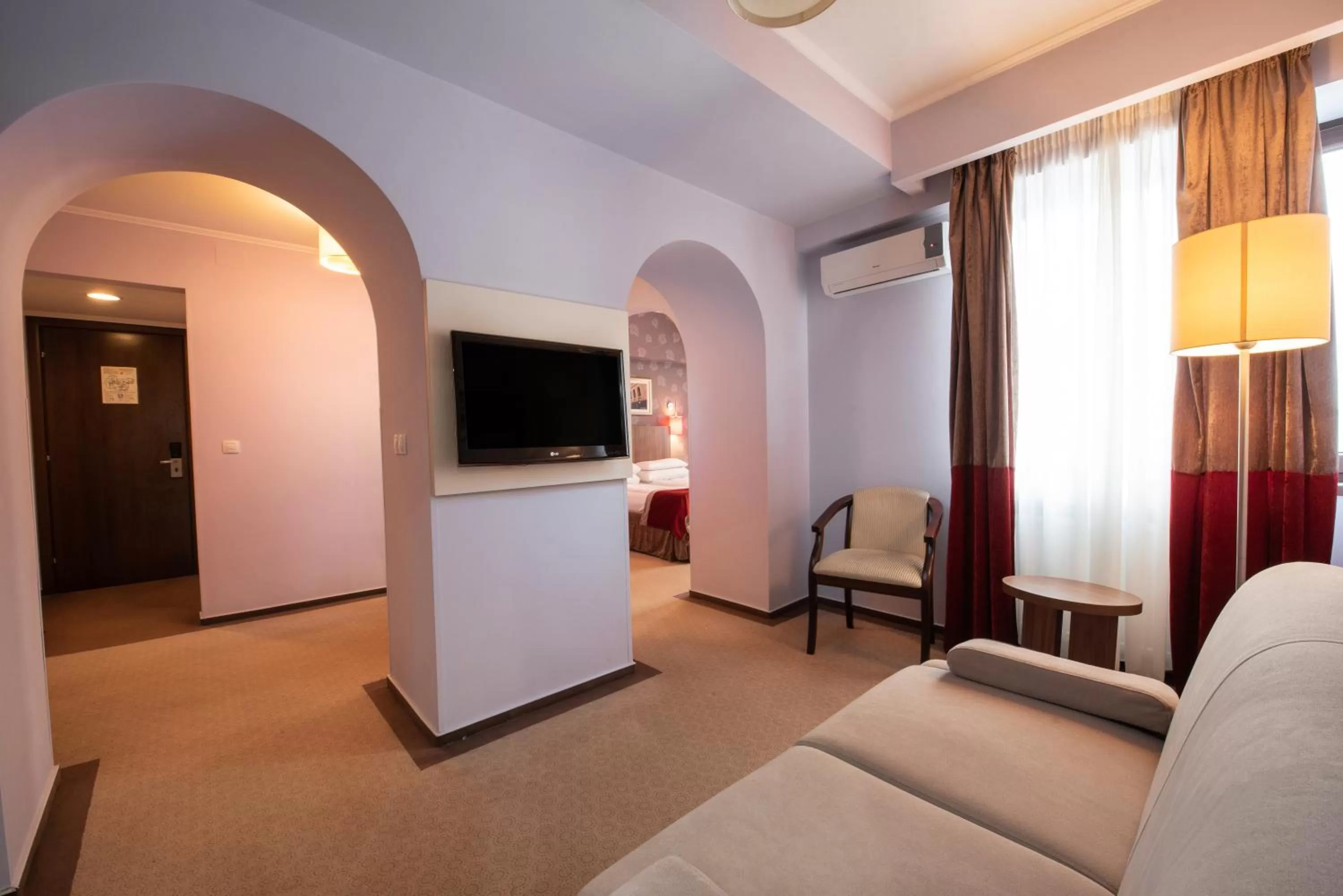 Photo of the whole room, TV/Entertainment Center in Hotel Ambasador