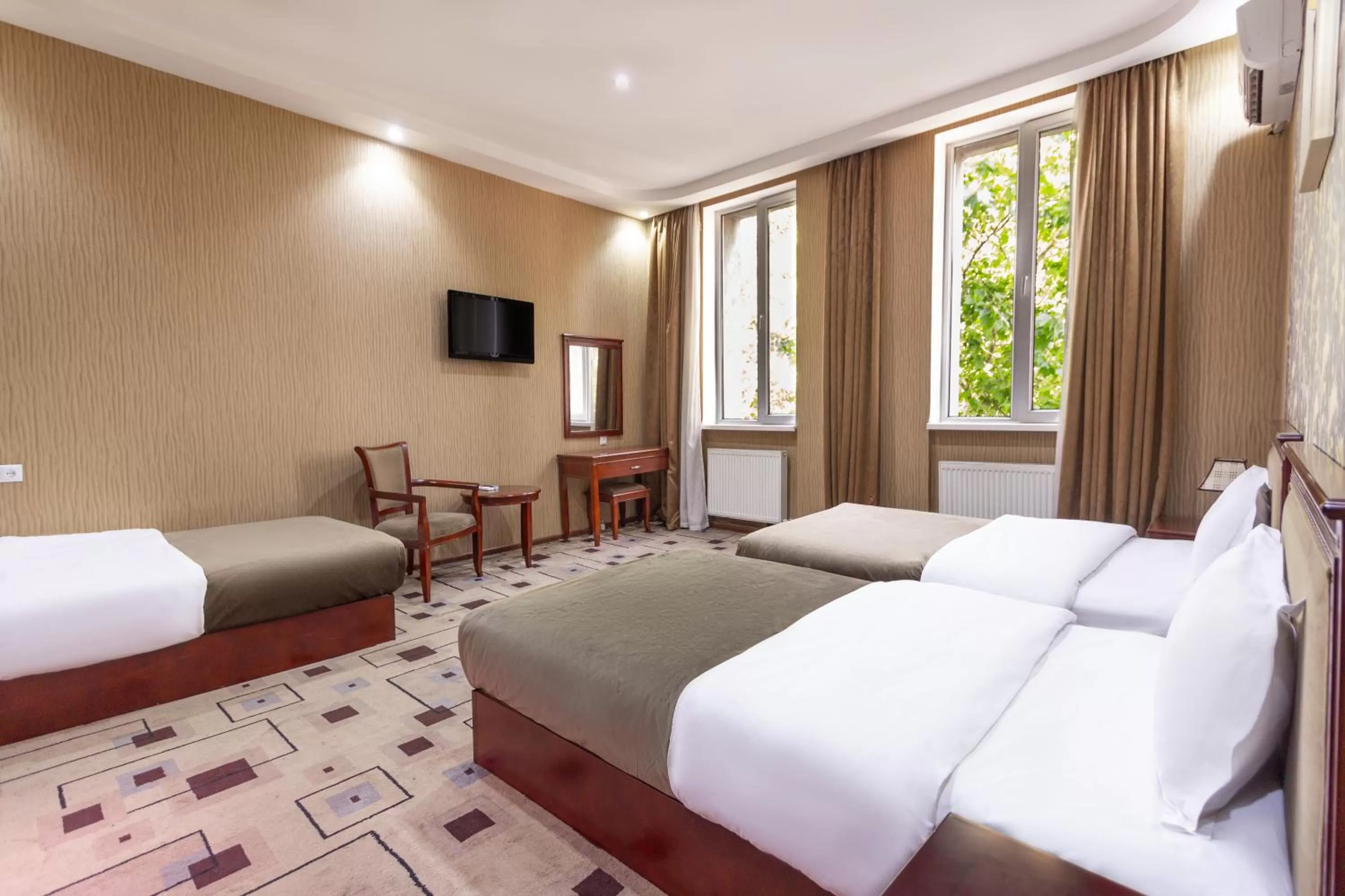 Communal lounge/ TV room in Margo Palace Hotel