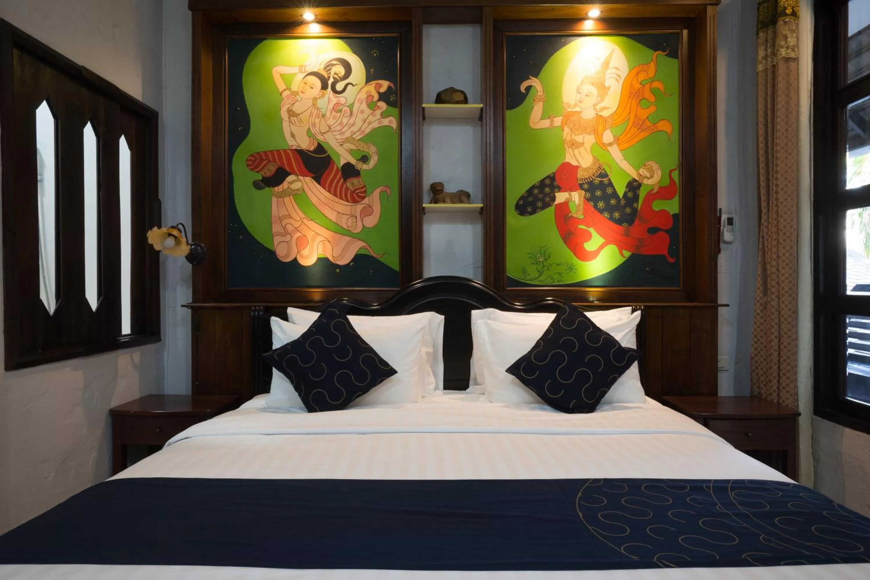 Bed in Cheva Gallery Boutique Hotel