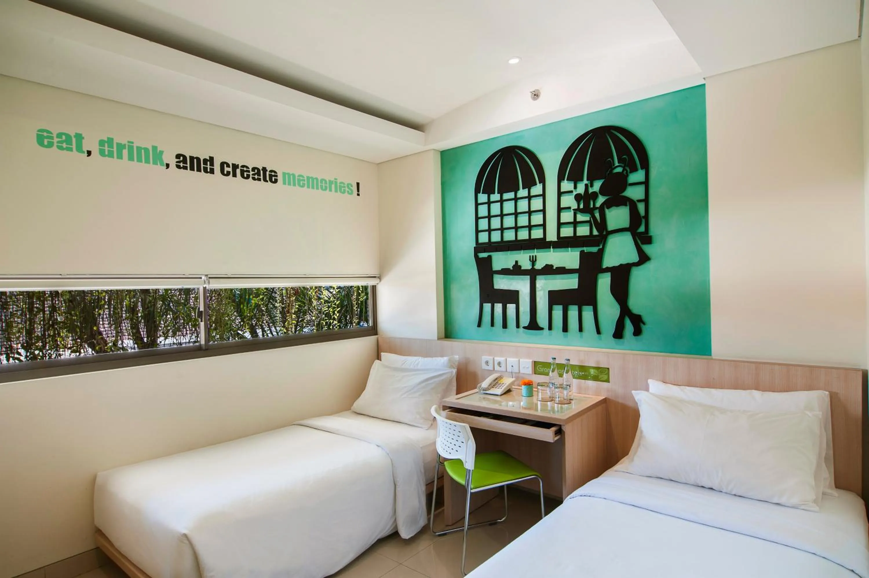 Bed in Grandmas Plus Hotel Legian