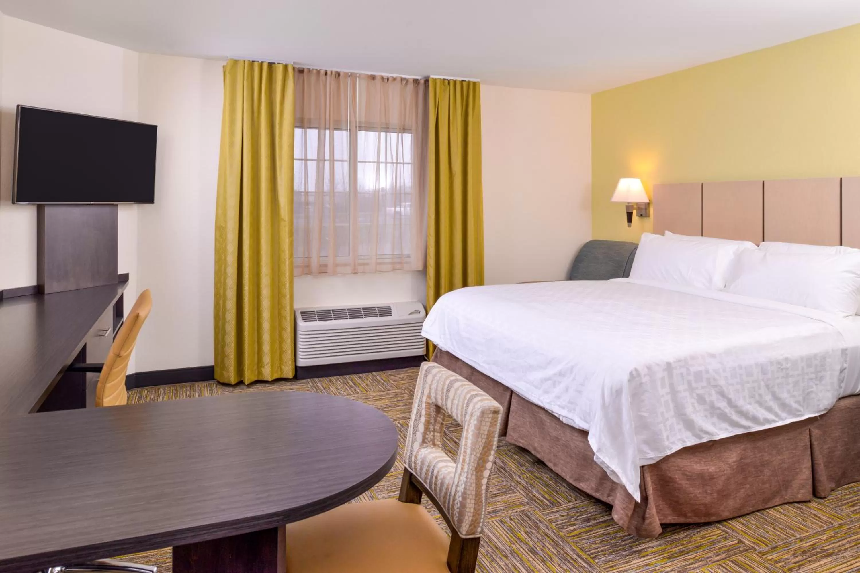 Bed in Candlewood Suites Paducah by IHG