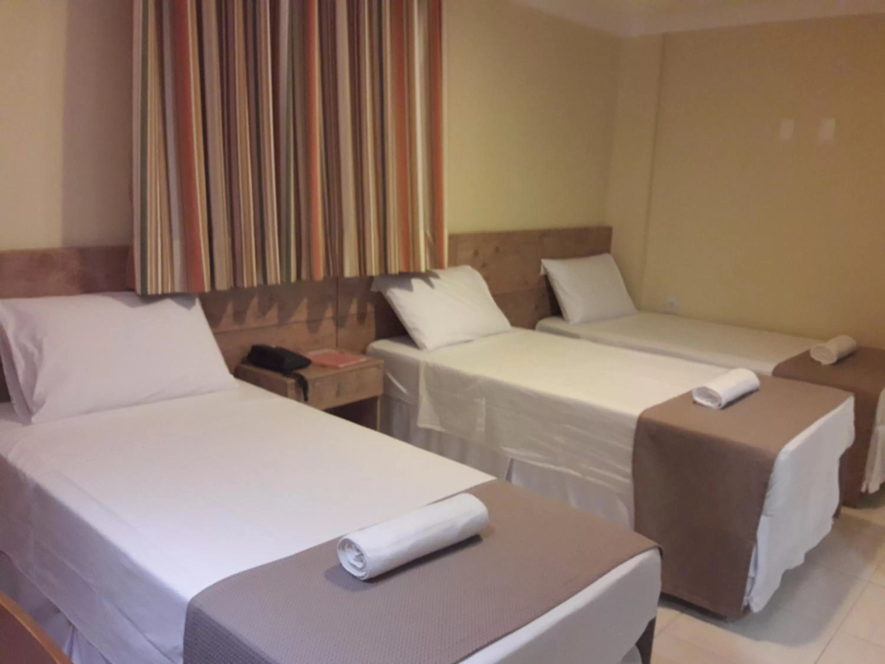 Bed in Hotel Sempre Executive