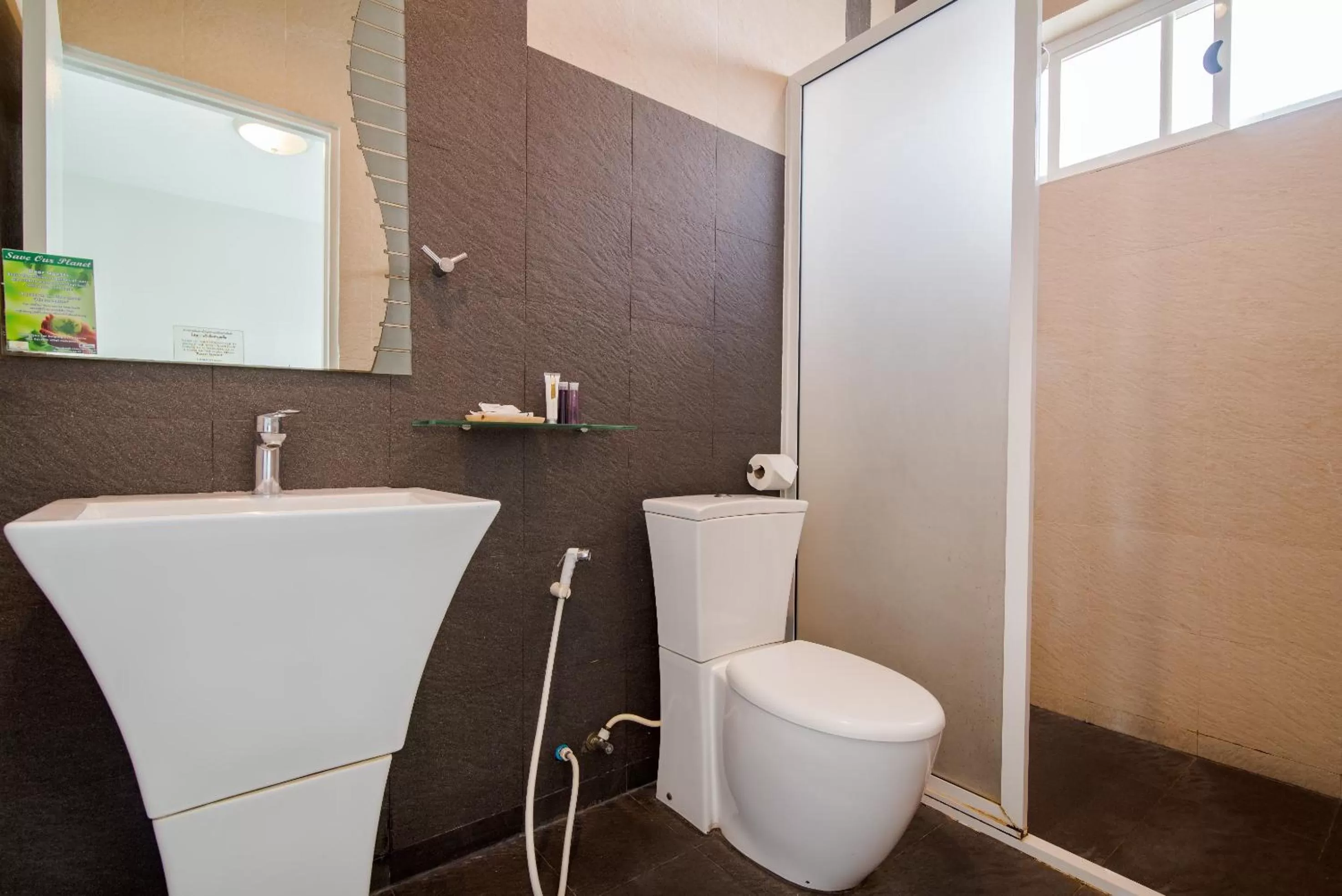 Toilet in The Beach Village Resort