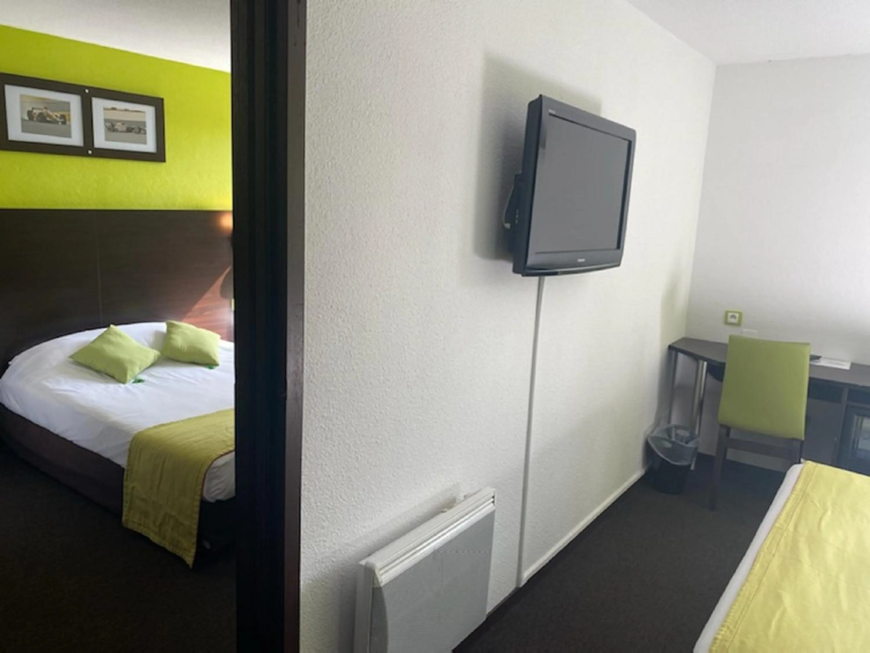 Photo of the whole room, Bed in Enzo Hotels Vierzon by Kyriad Direct