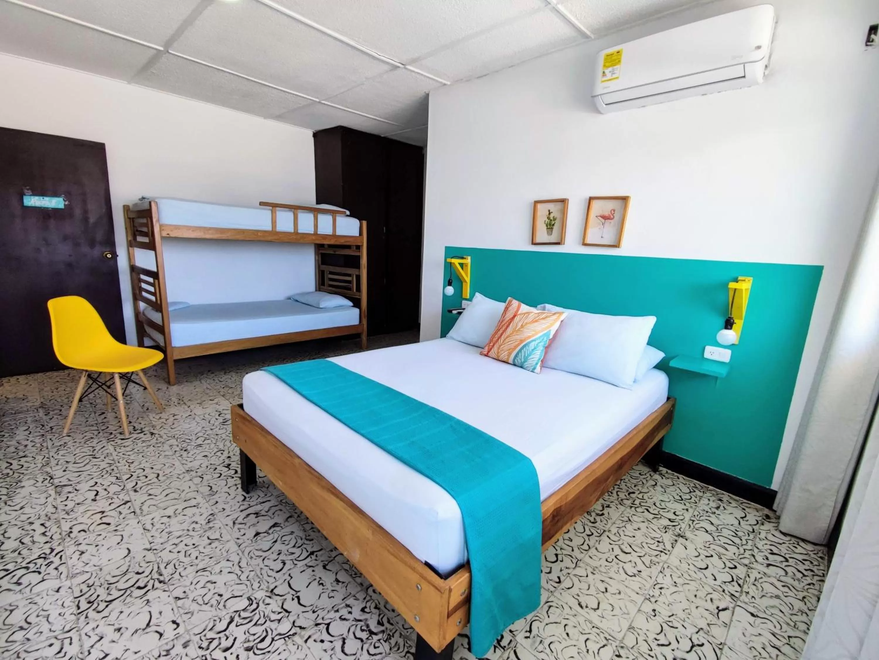 Bed in Bona Vida Hotel