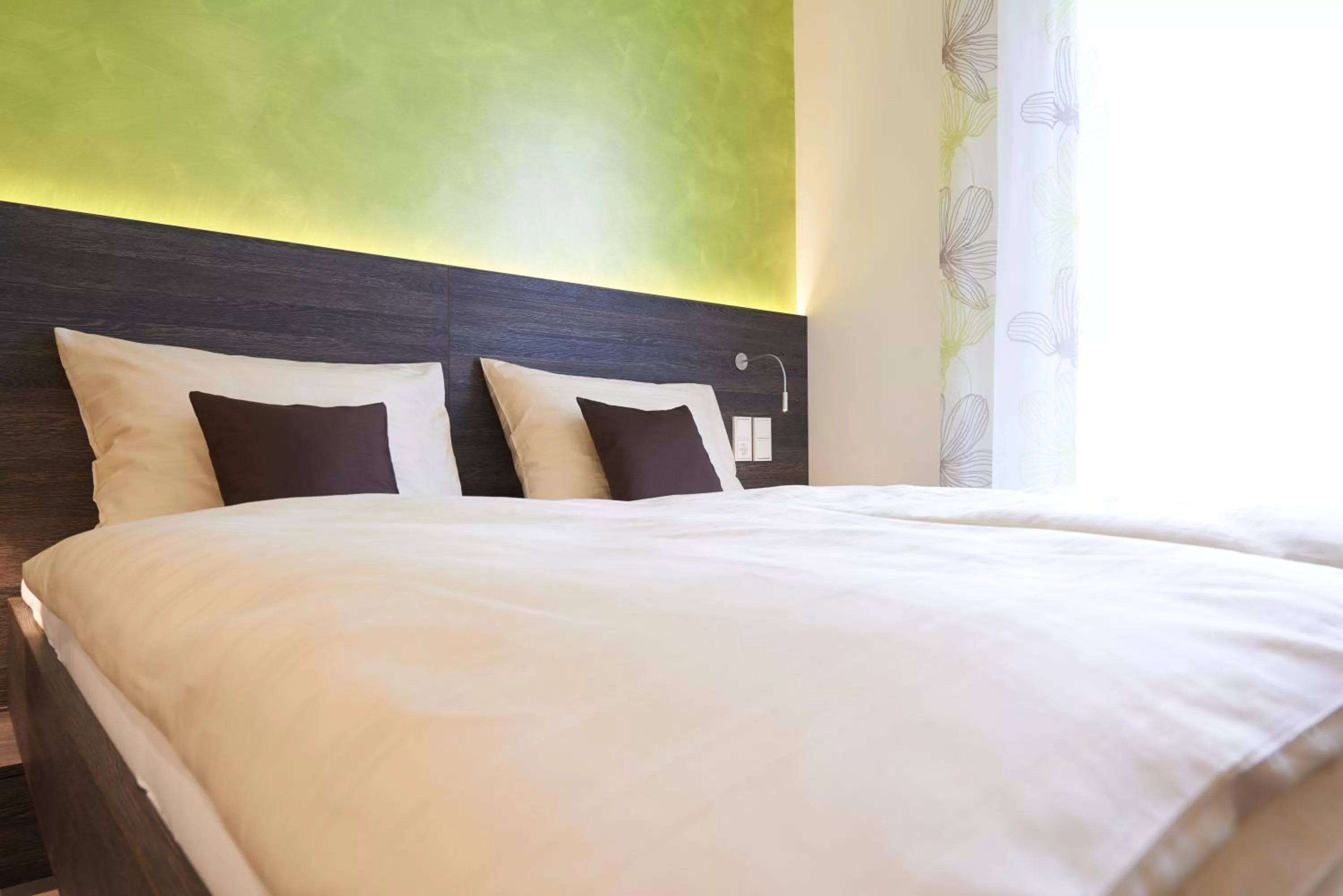 Decorative detail, Bed in eee Hotel Traun