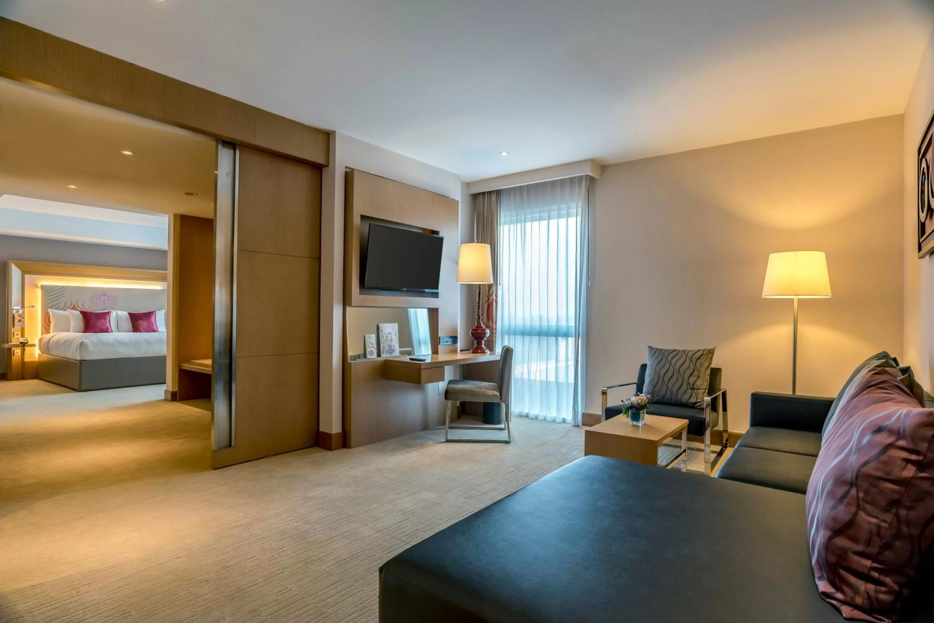 Living room, Bed in Novotel Yangon Max