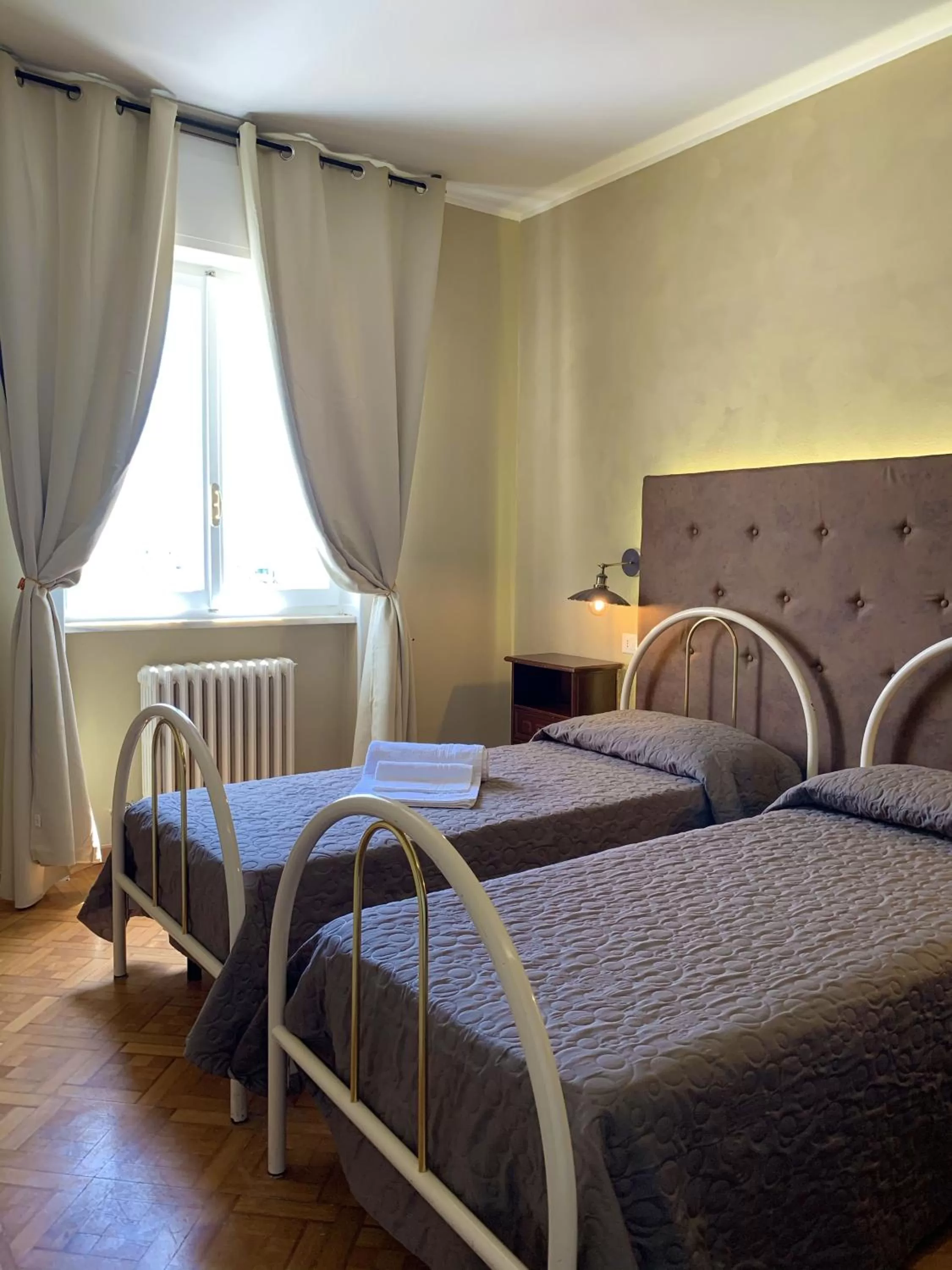 Bedroom, Bed in L'Attico di Piazza Mazzini Rooms