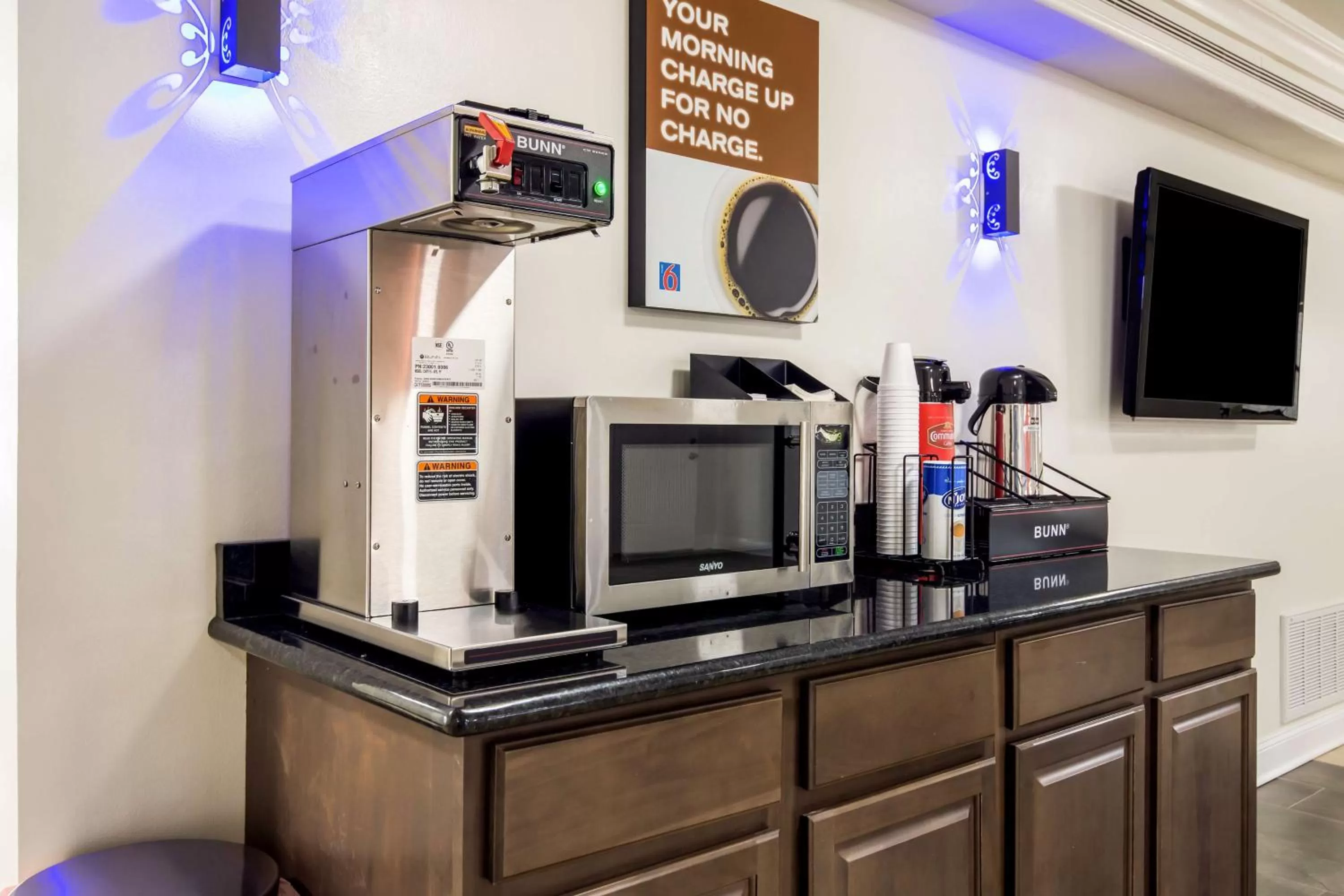 Communal lounge/ TV room in Motel 6-North Little Rock, AR - McCain