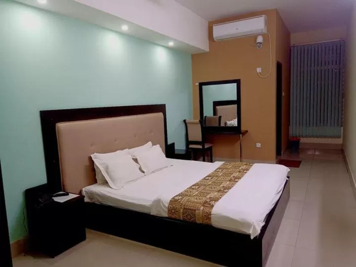 Bed in Grand Surma Hotel