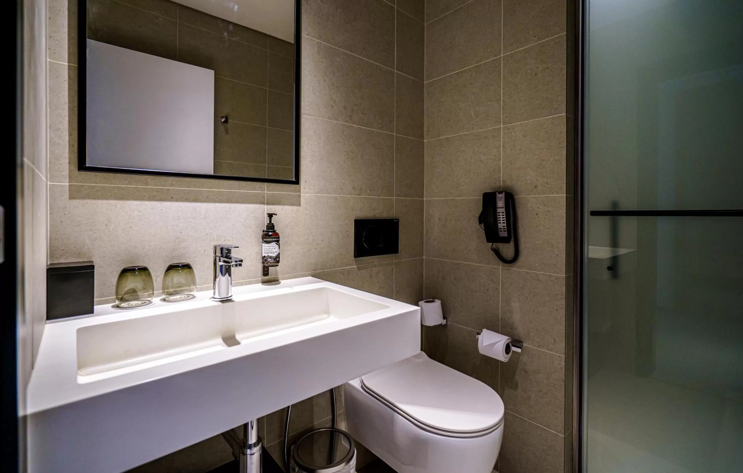 Toilet in FORM Hotel Al Jaddaf, Dubai, a Member of Design Hotels