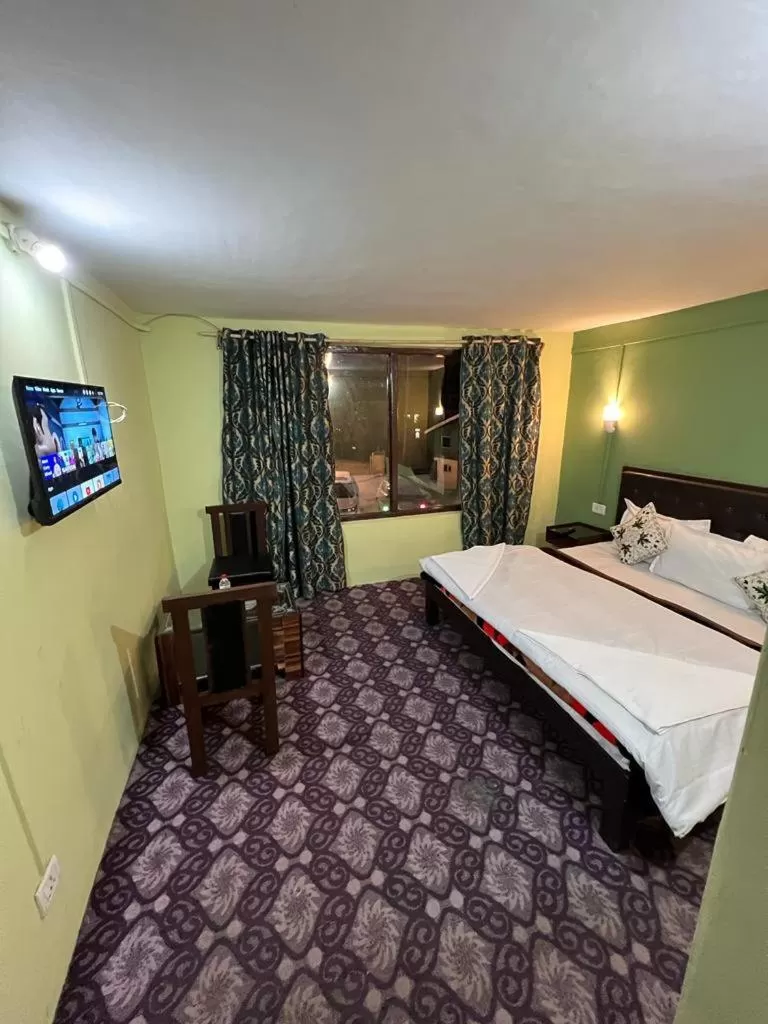 Bed in Dreamland Cottage