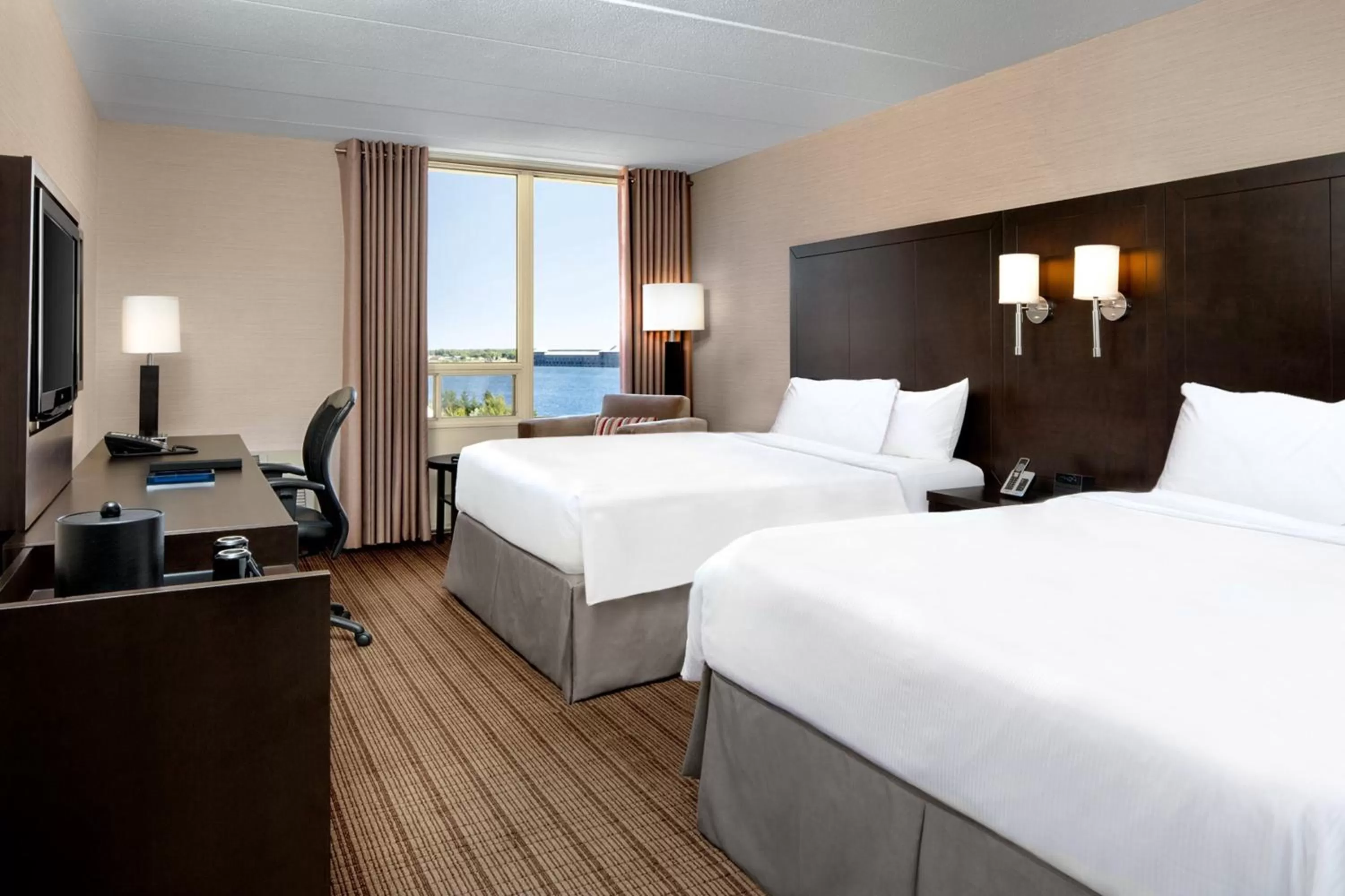 Photo of the whole room, Bed in Delta Hotels by Marriott Sault Ste. Marie Waterfront