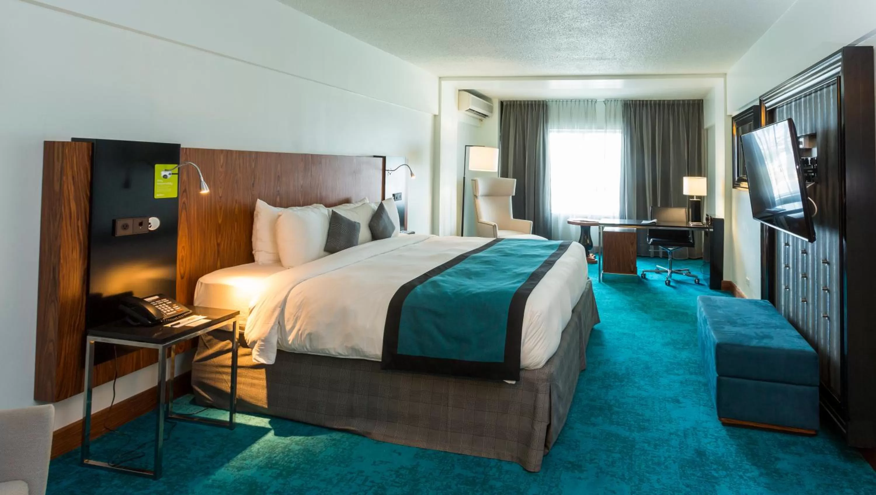 Photo of the whole room, Bed in Radisson Hotel Trinidad