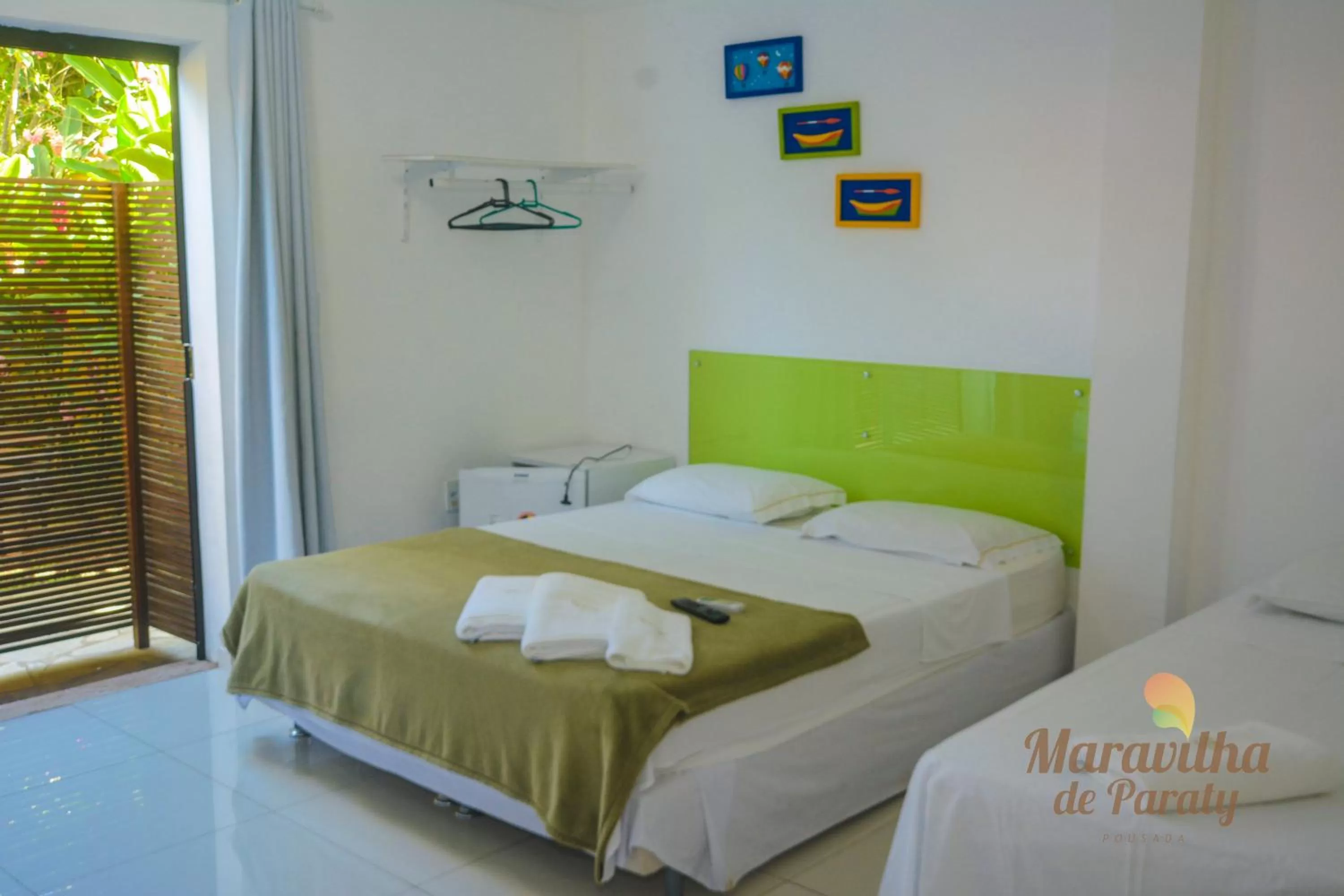 Photo of the whole room, Bed in Pousada Maravilha de Paraty