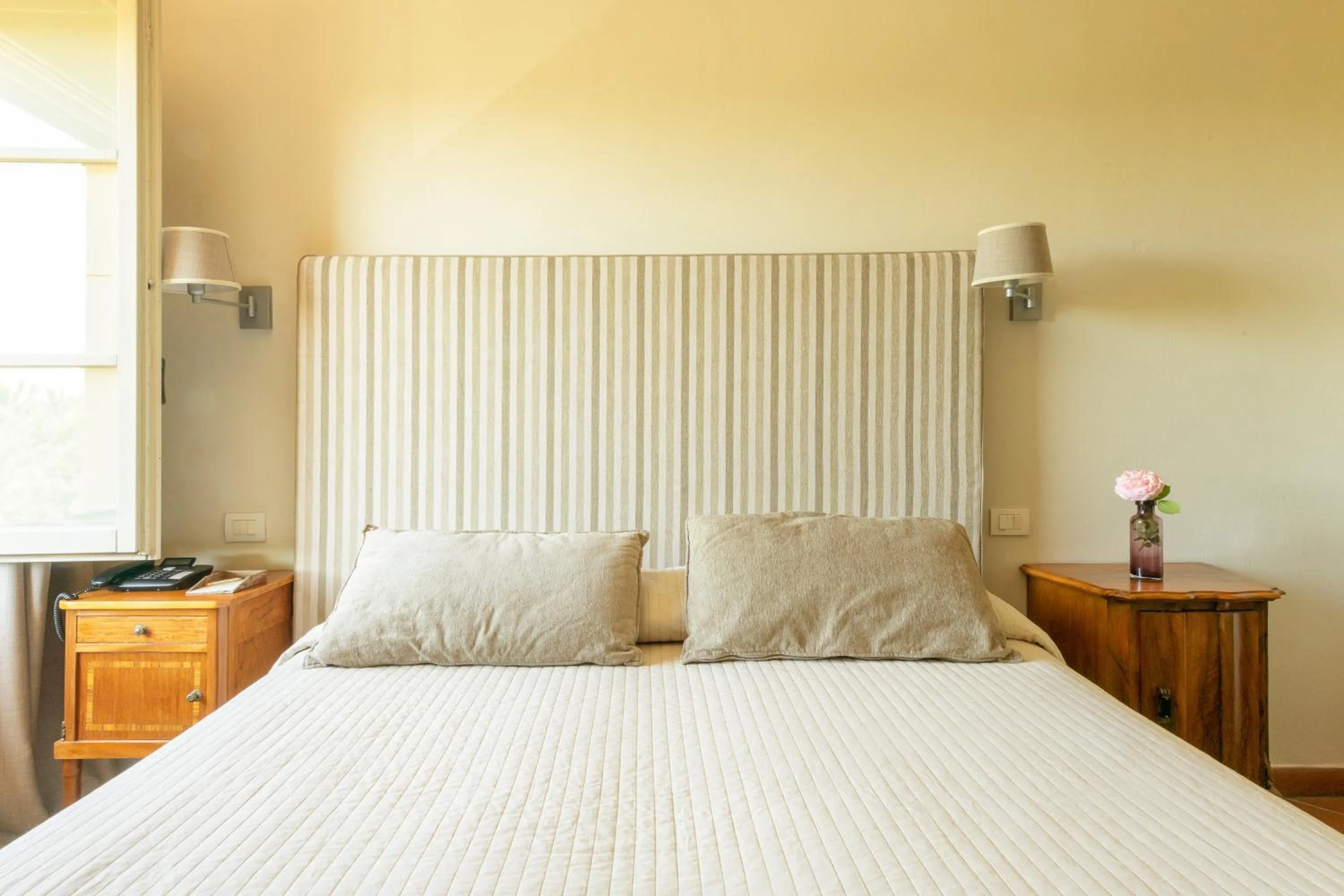 Bed in Si Montalcino Hotel