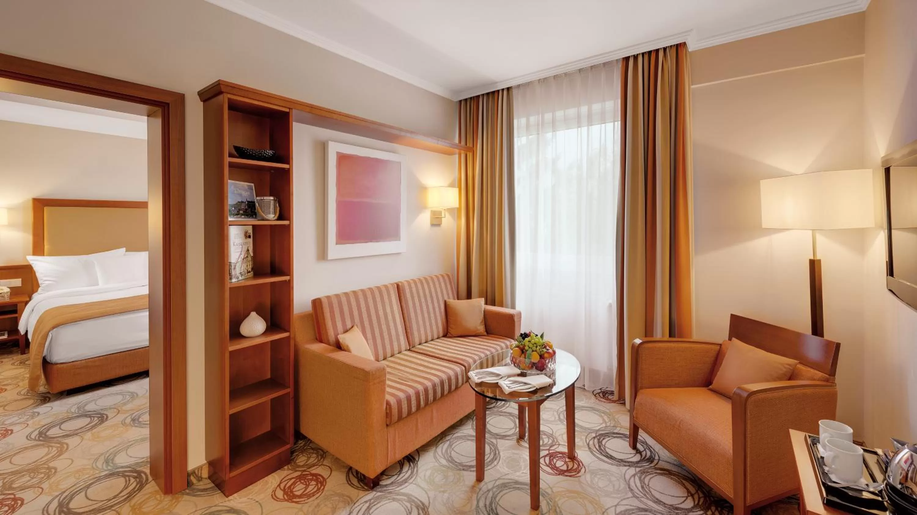 Seating area, Bed in Hotel Oranien Wiesbaden