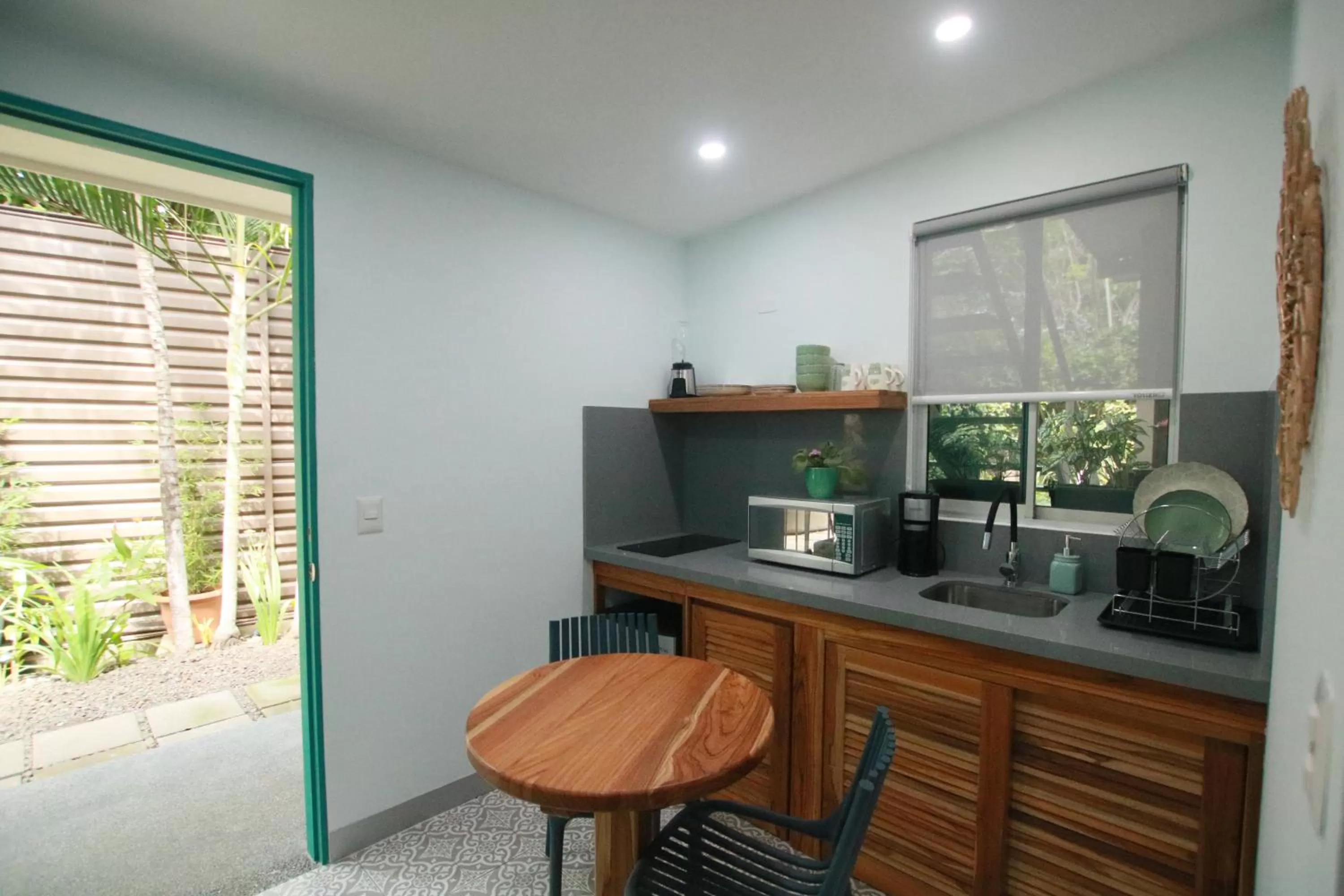 Kitchen or kitchenette in Tamarindo Bay Boutique Hotel, Apartments & Suites