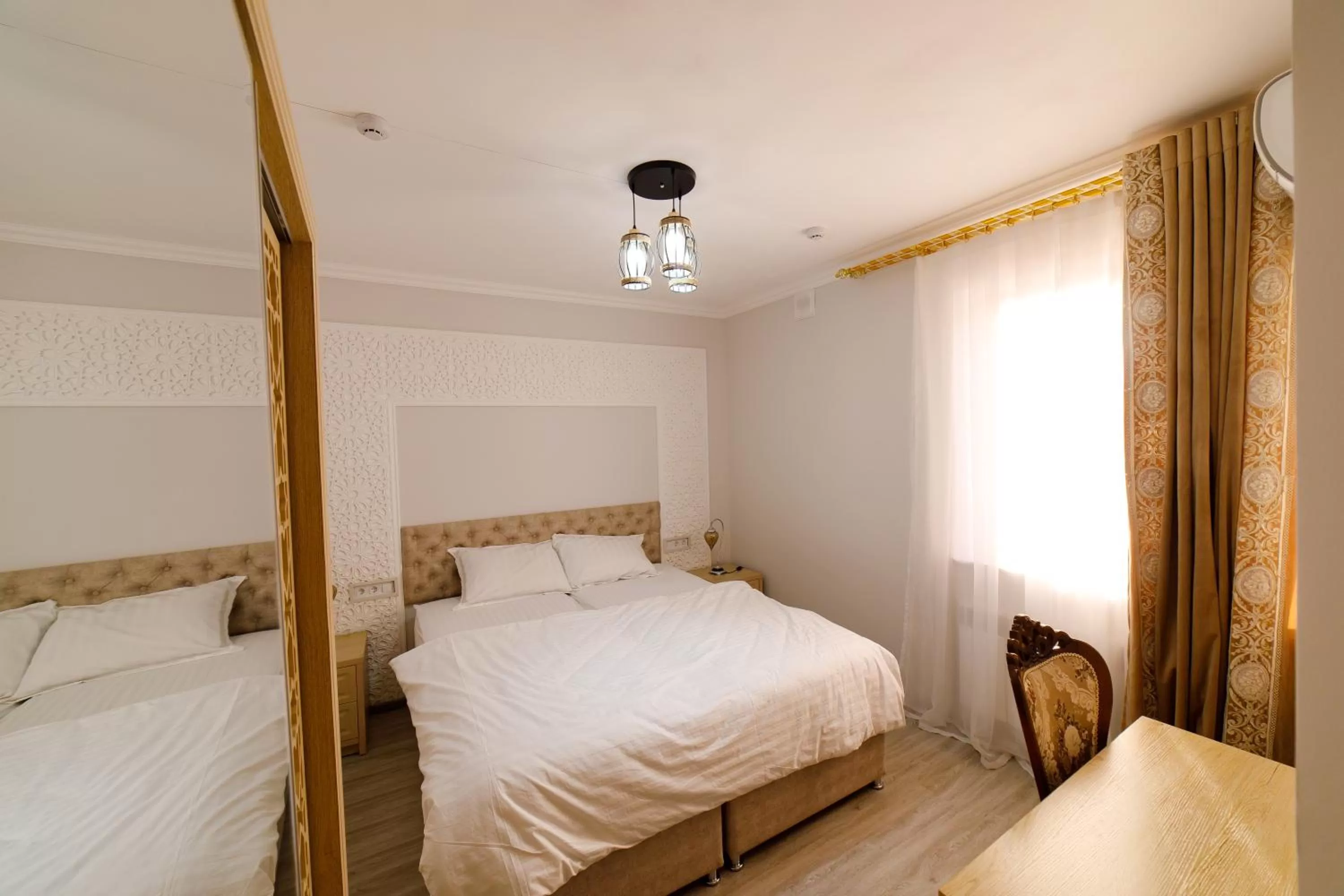 Bed in Khans Palace Hotel