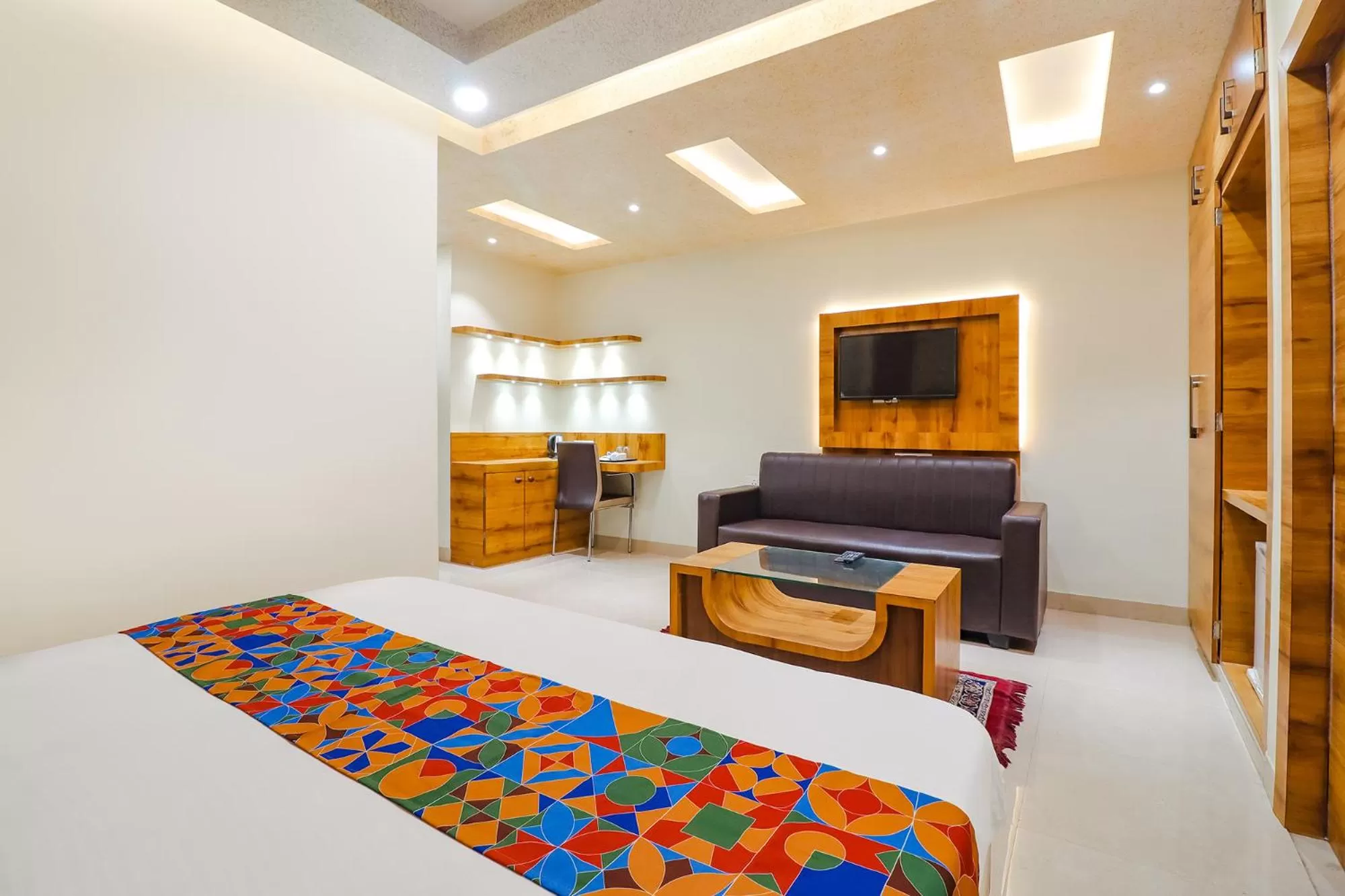 Bed in FabHotel Holiday Grand