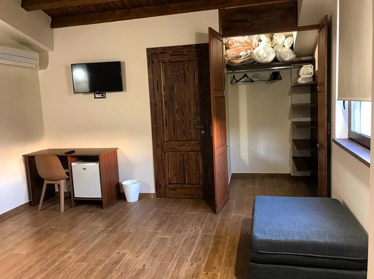 Communal lounge/ TV room in LA PERGOLA - Affitta Camere