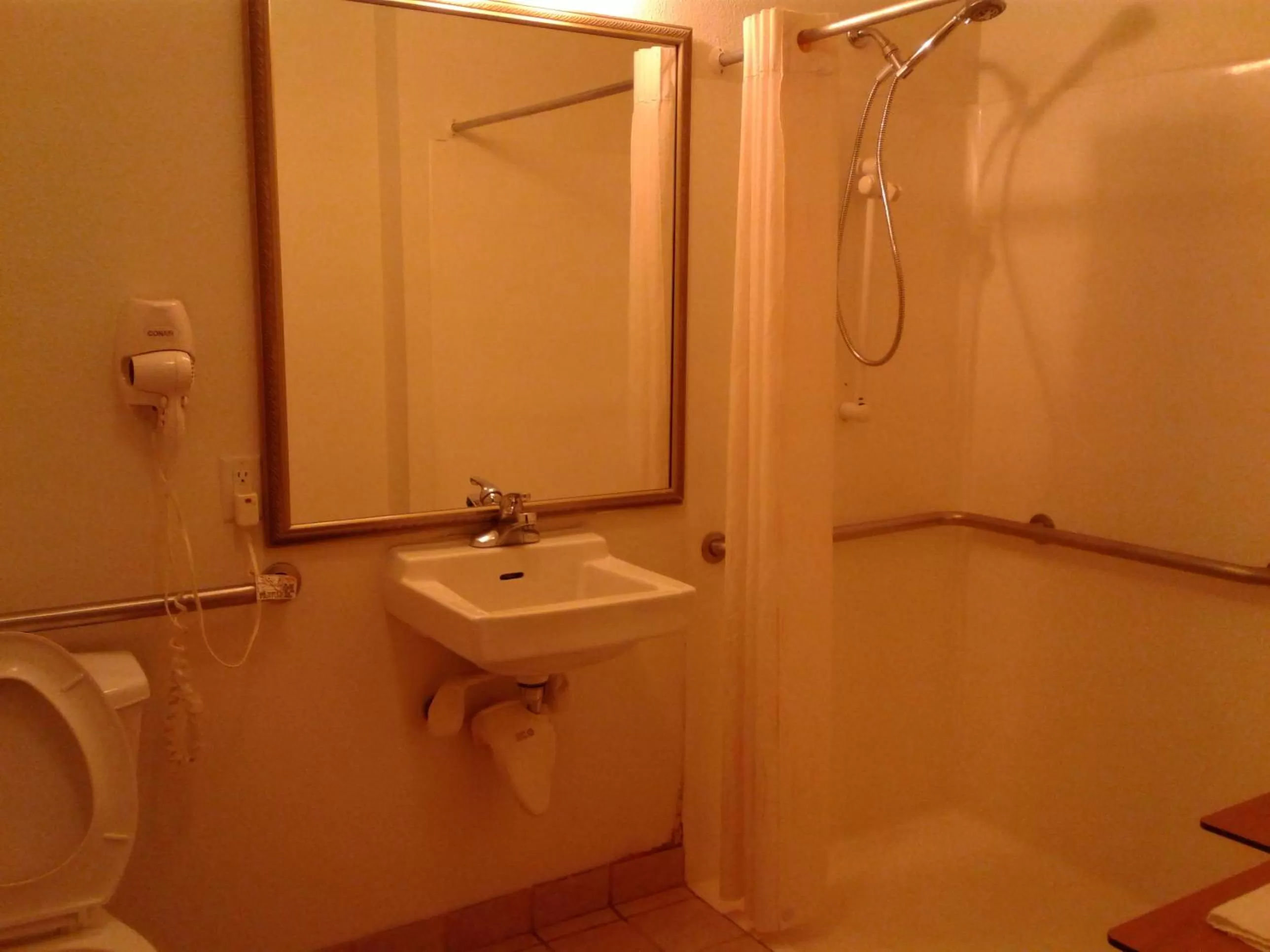 Bathroom in Super 8 by Wyndham Garland Rowlett East Dallas Area