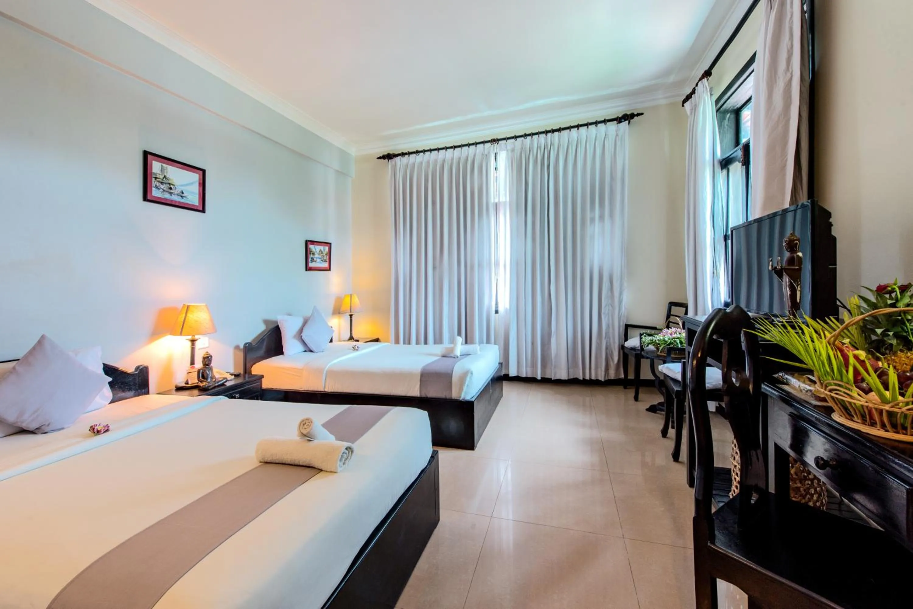 Photo of the whole room, Bed in Angkor Panoramic Boutique Hotel