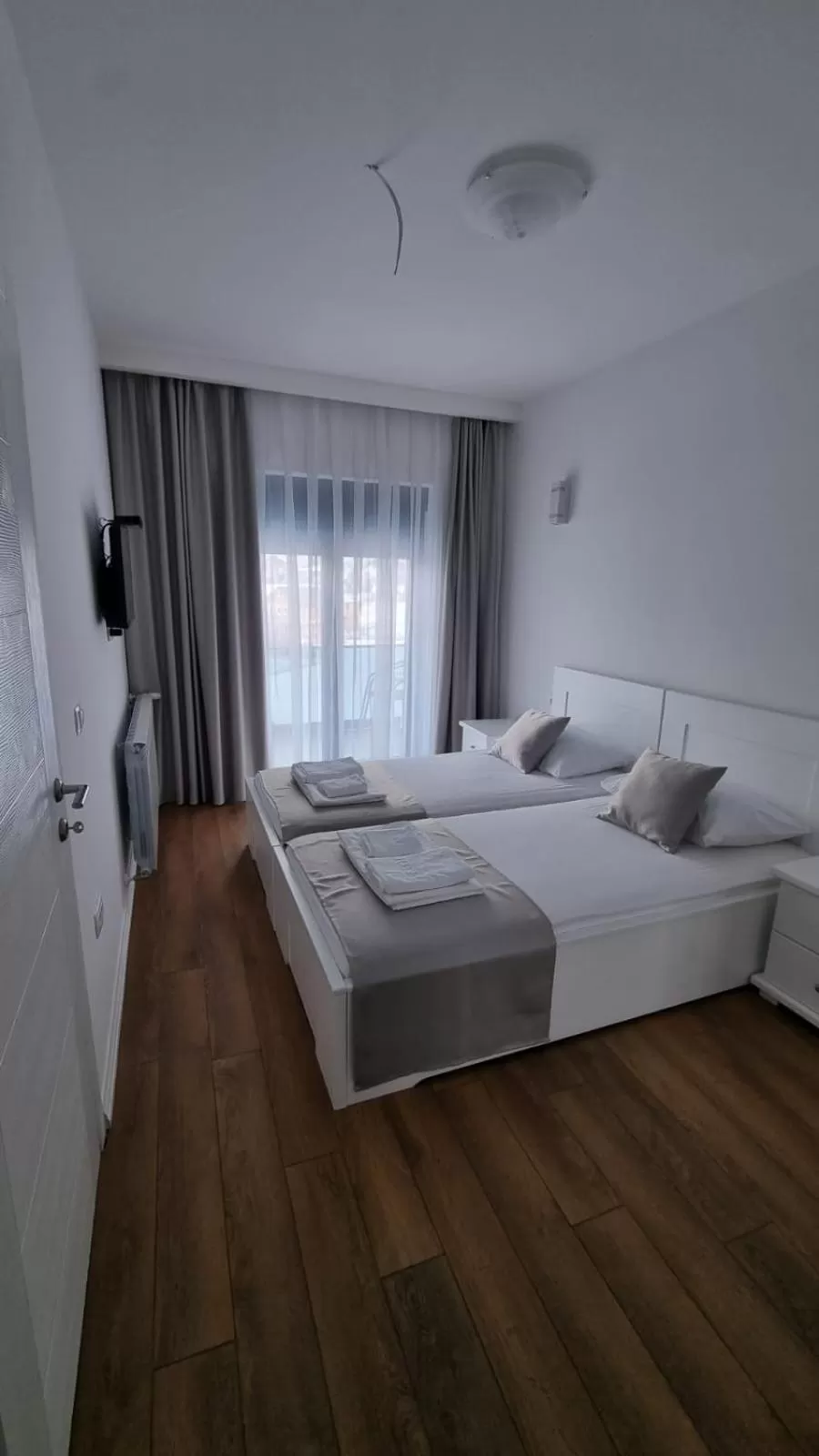 Bed in Elan Luxury Apartments & Lounge Bar