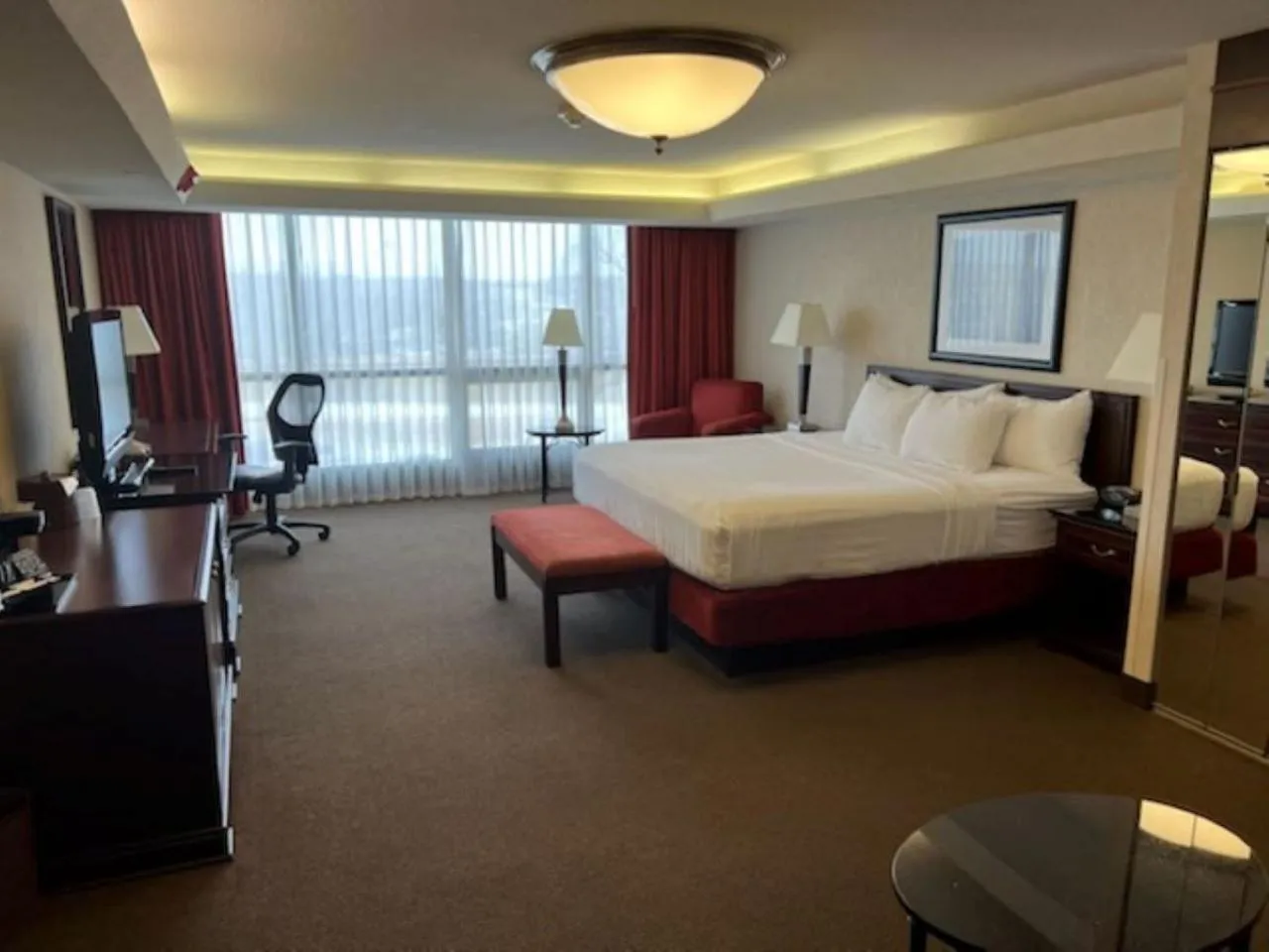 Bed in Hotel Lotus Kansas City Merriam