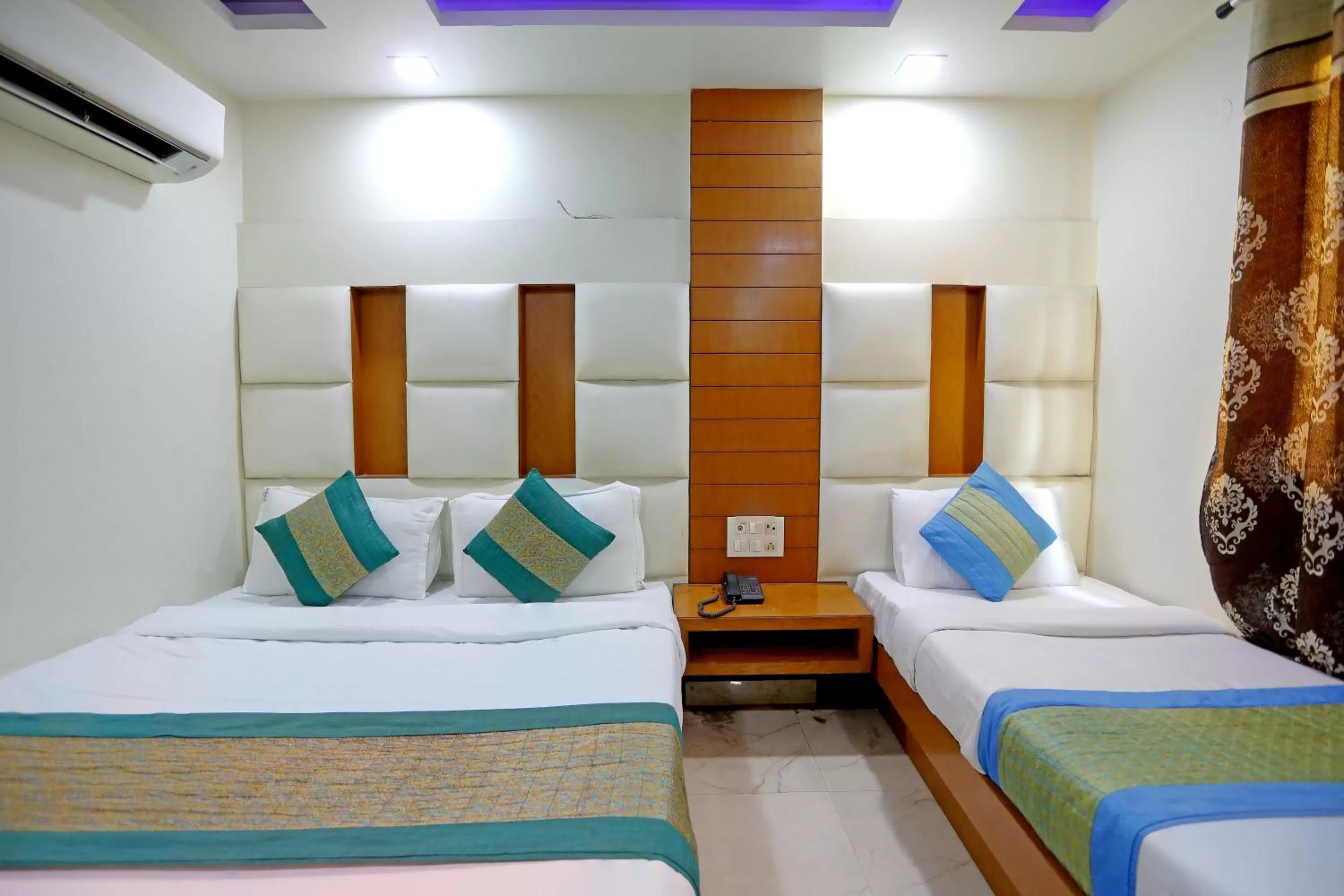 Photo of the whole room, Bed in Tashkent Palace - Walk in from NDLS Station & RK Ashram Metro Station