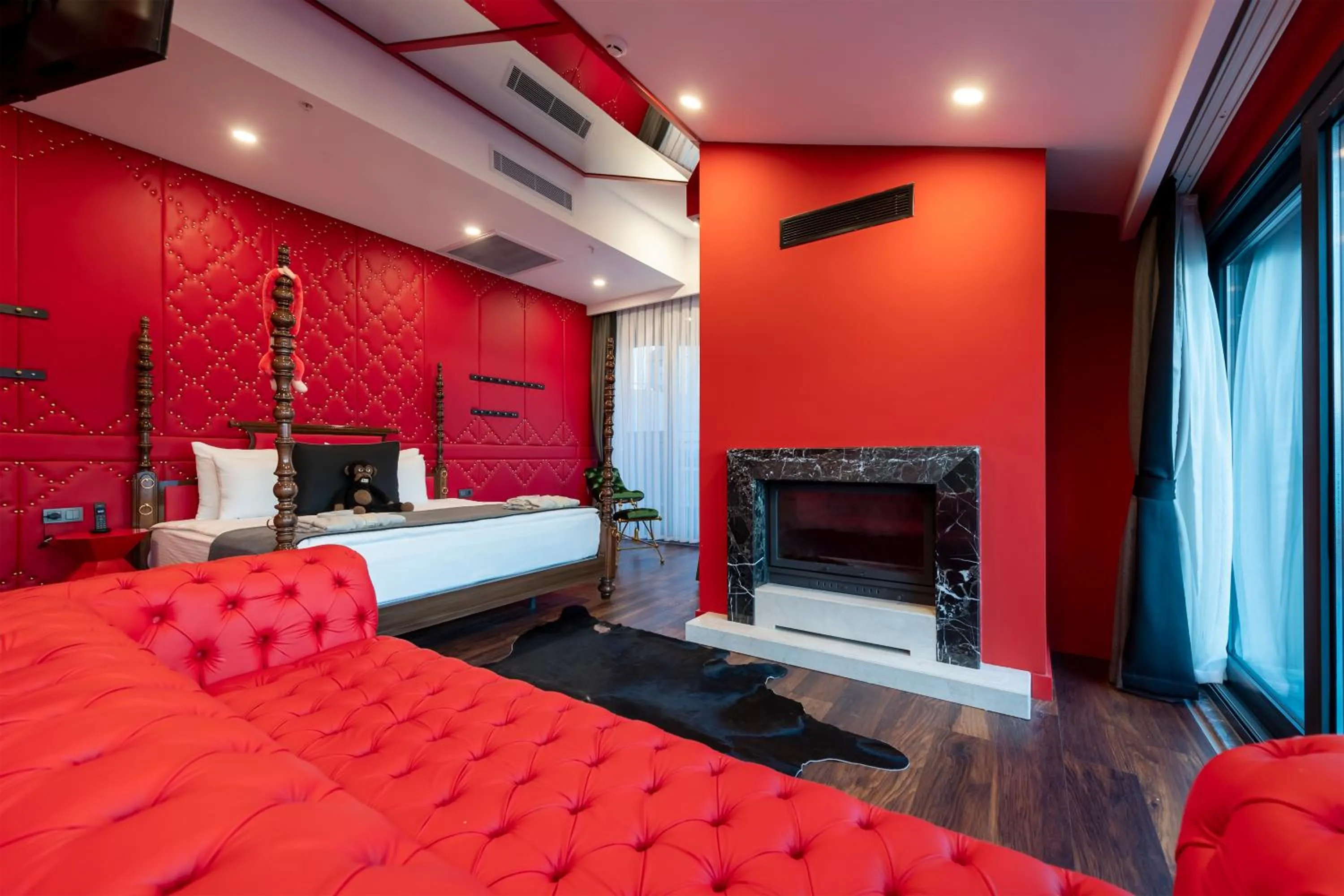 Seating area, Bed in Lucky Monkey Hotel