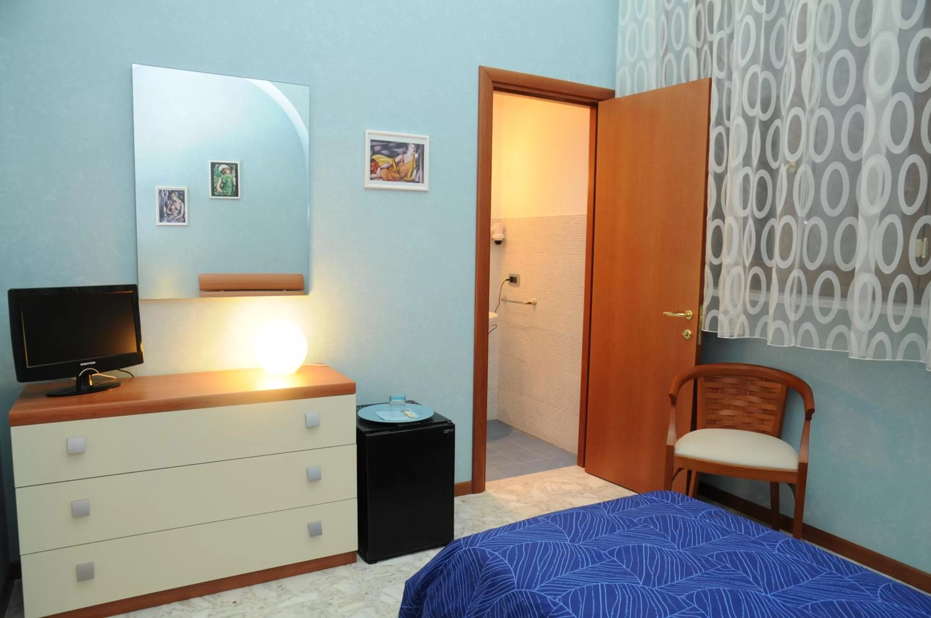 TV/Entertainment Center in Affittacamere Conte Di Cavour